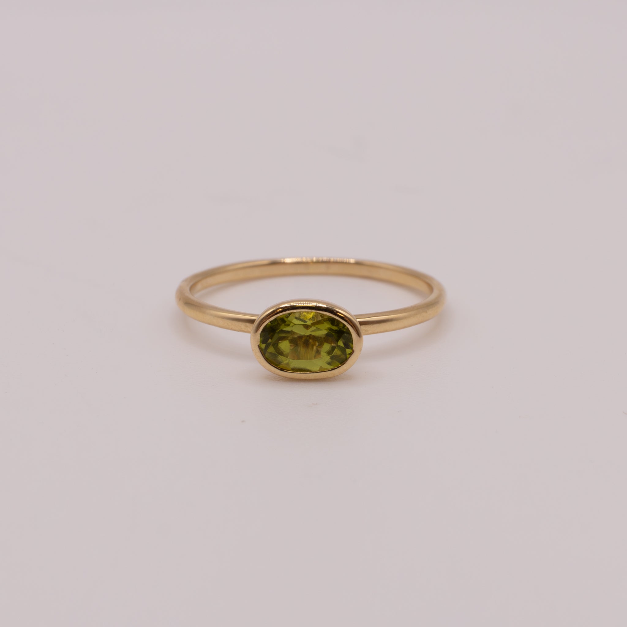 14KYG Peridot Oval Bezel Set RIng
