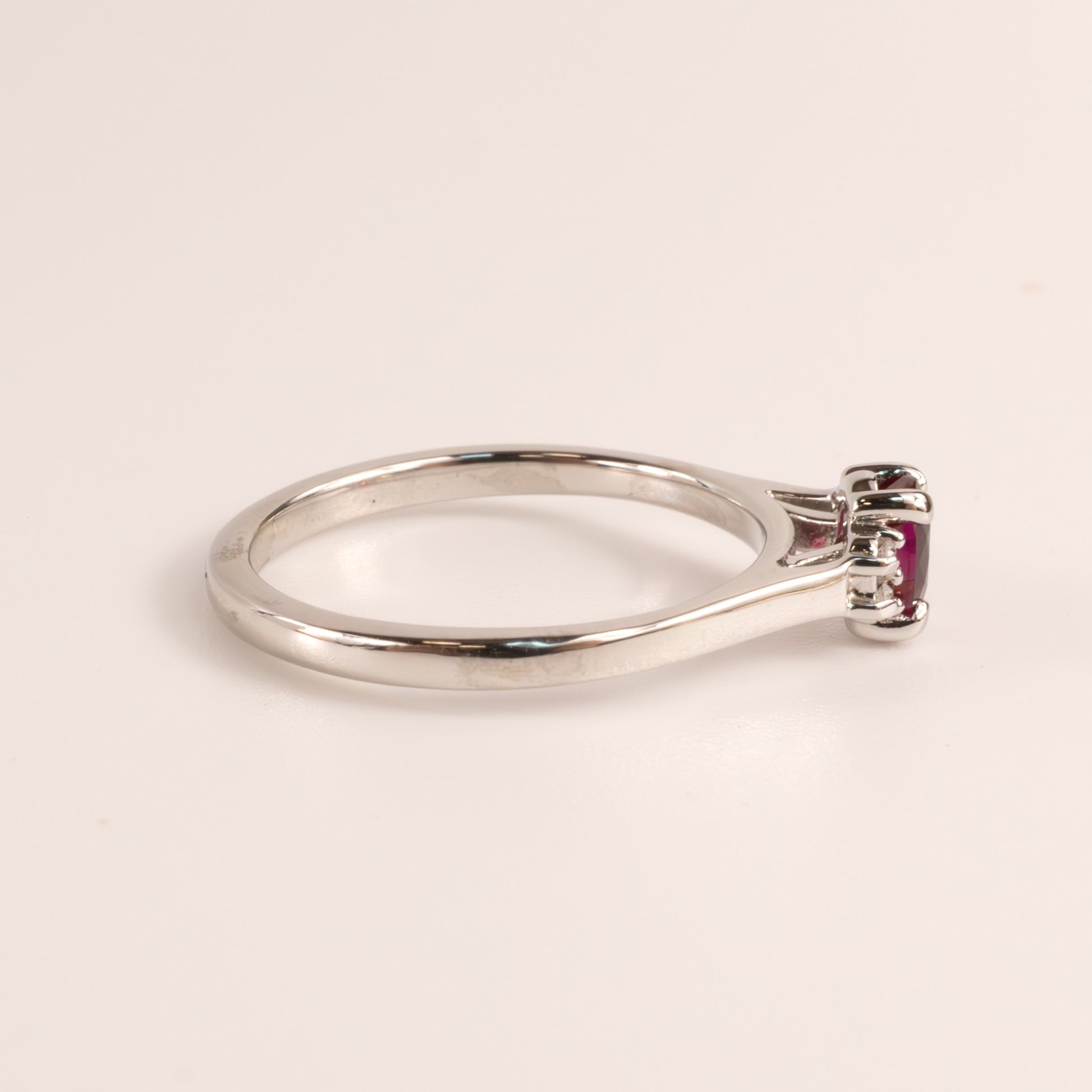14KWG Ruby 0.50ct Oval and Diamond 0.04cttw Ring