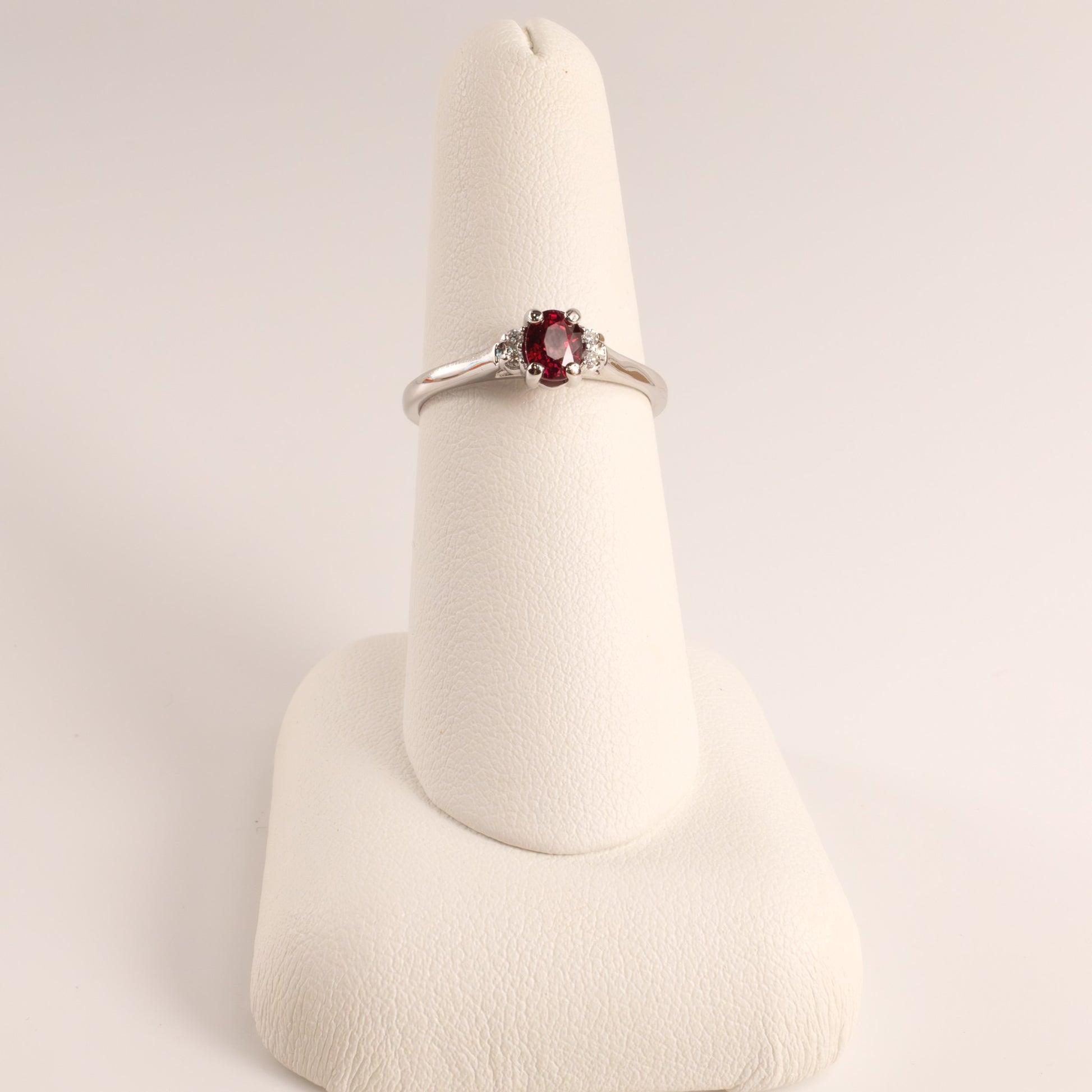 14KWG Ruby 0.50ct Oval and Diamond 0.04cttw Ring
