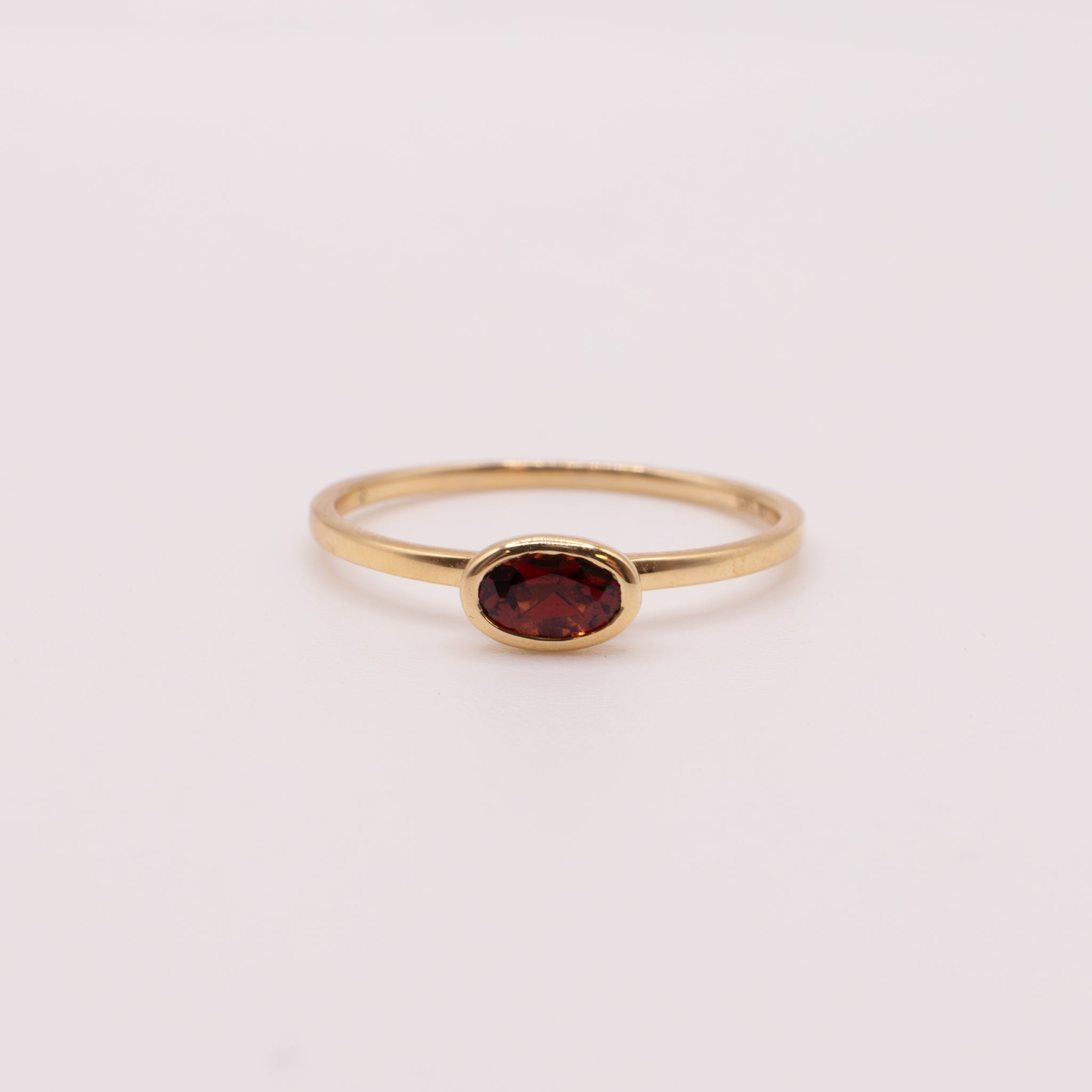 14KYG Garnet Bezel Set Oval Ring
