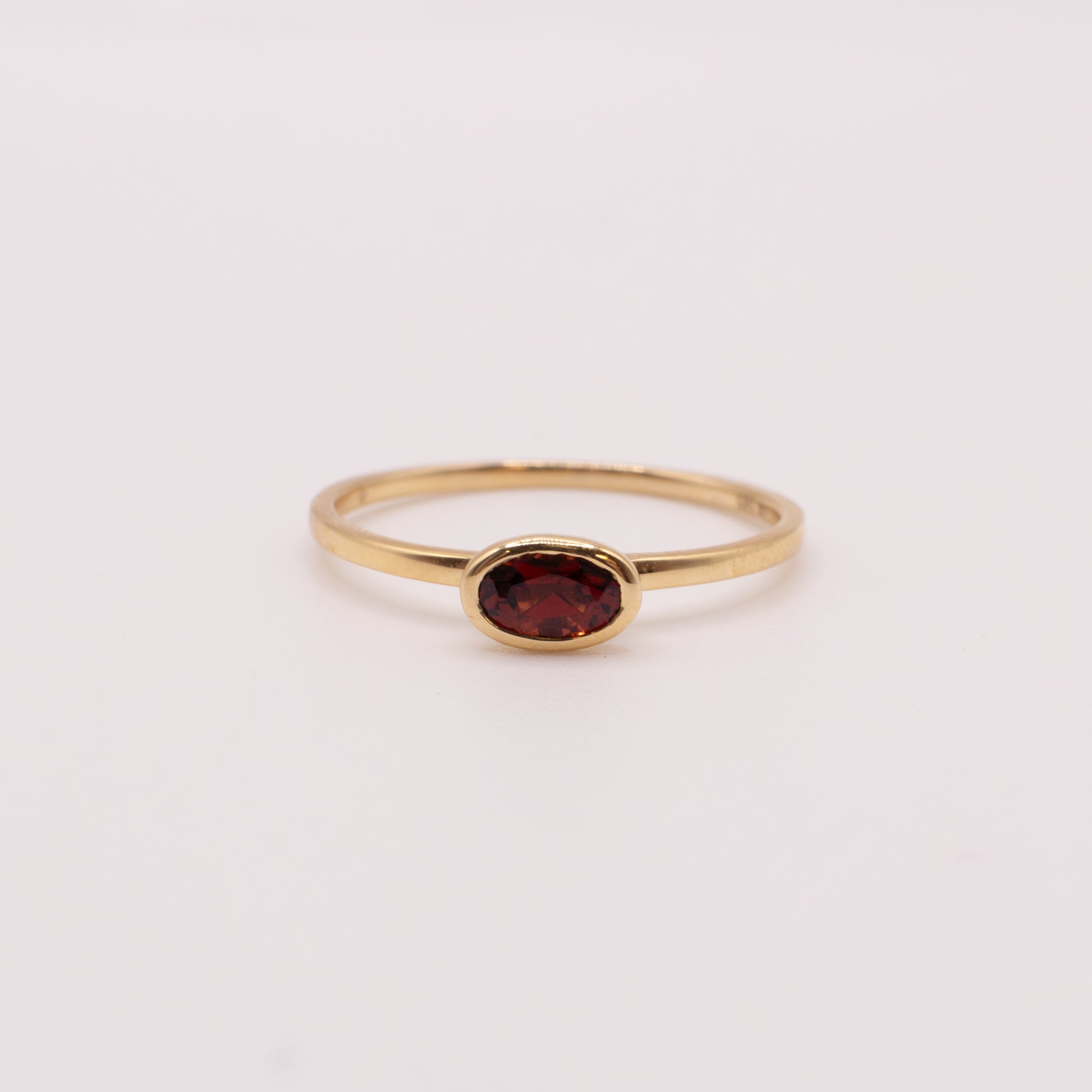 14KYG Garnet Bezel Set Oval Ring