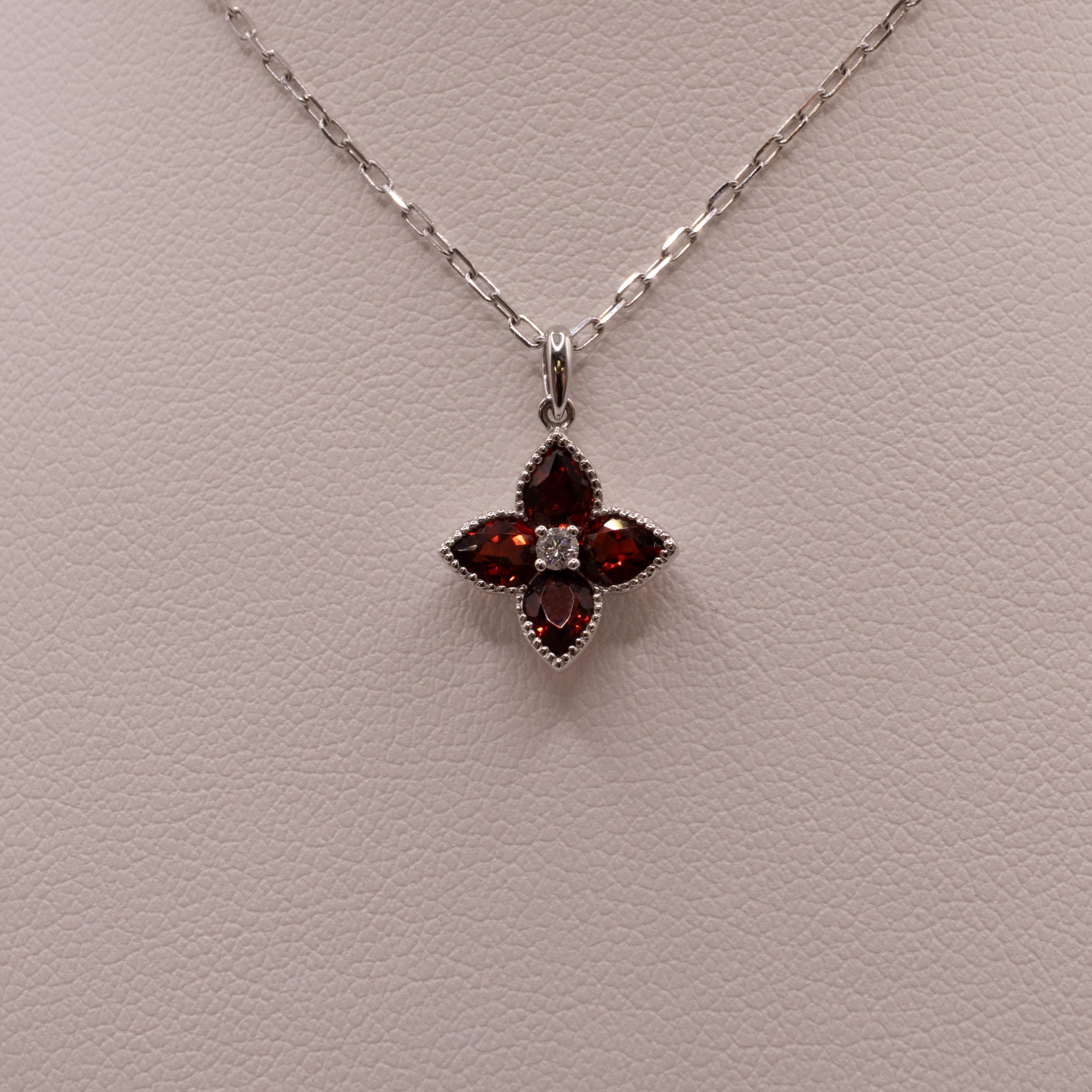 14KWG Garnet and Diamond Flower Necklace