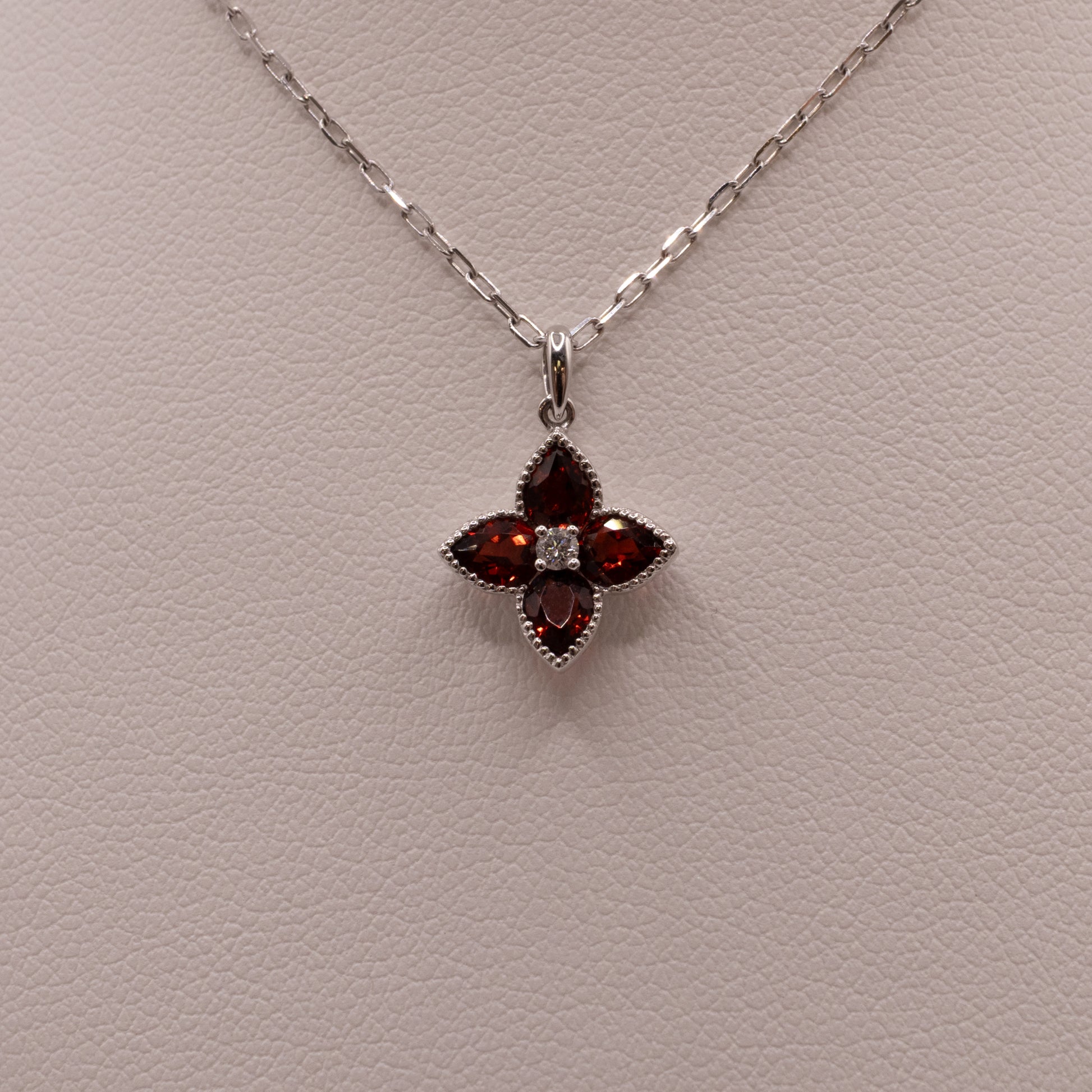 14KWG Garnet and Diamond Flower Necklace