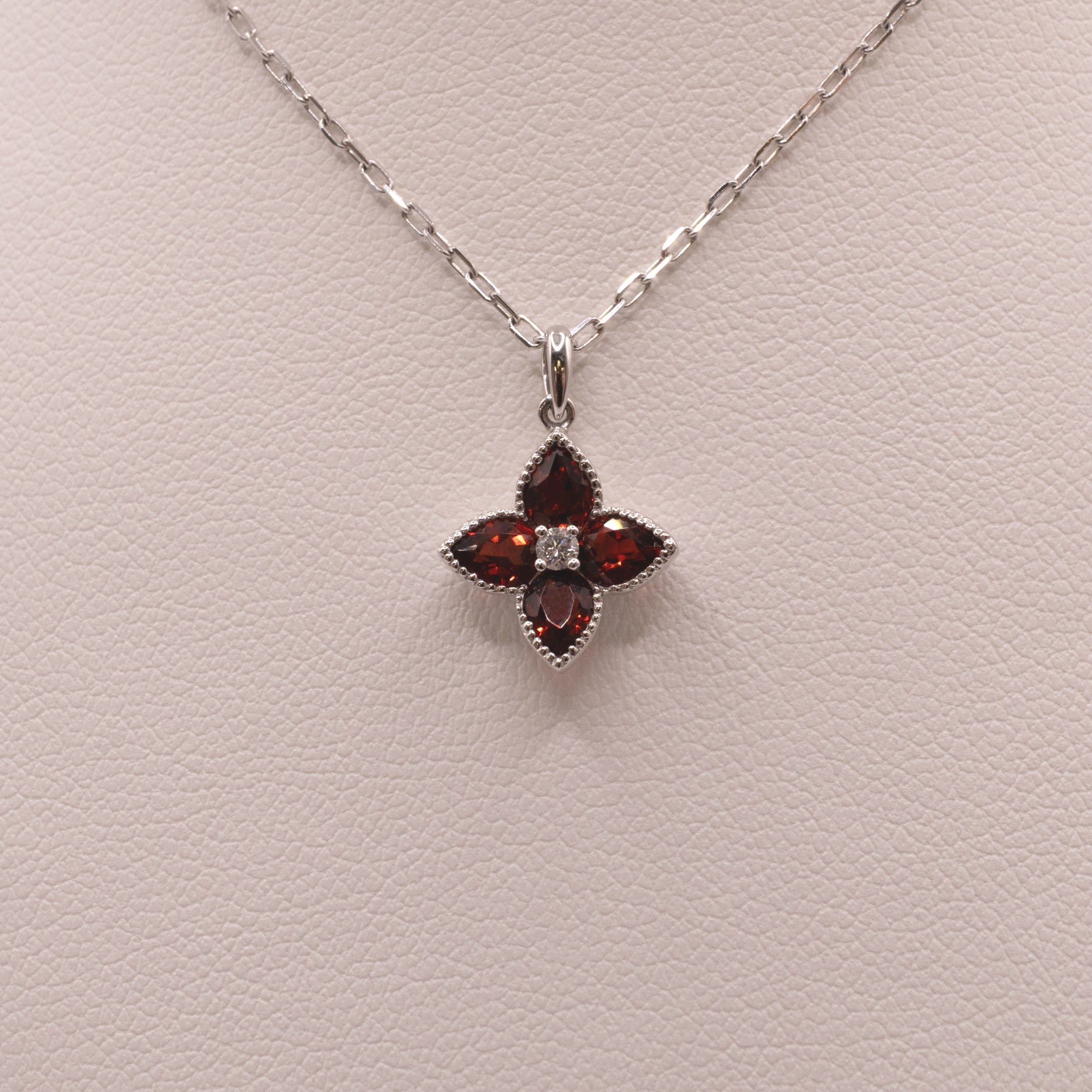 14KWG Garnet and Diamond Flower Necklace