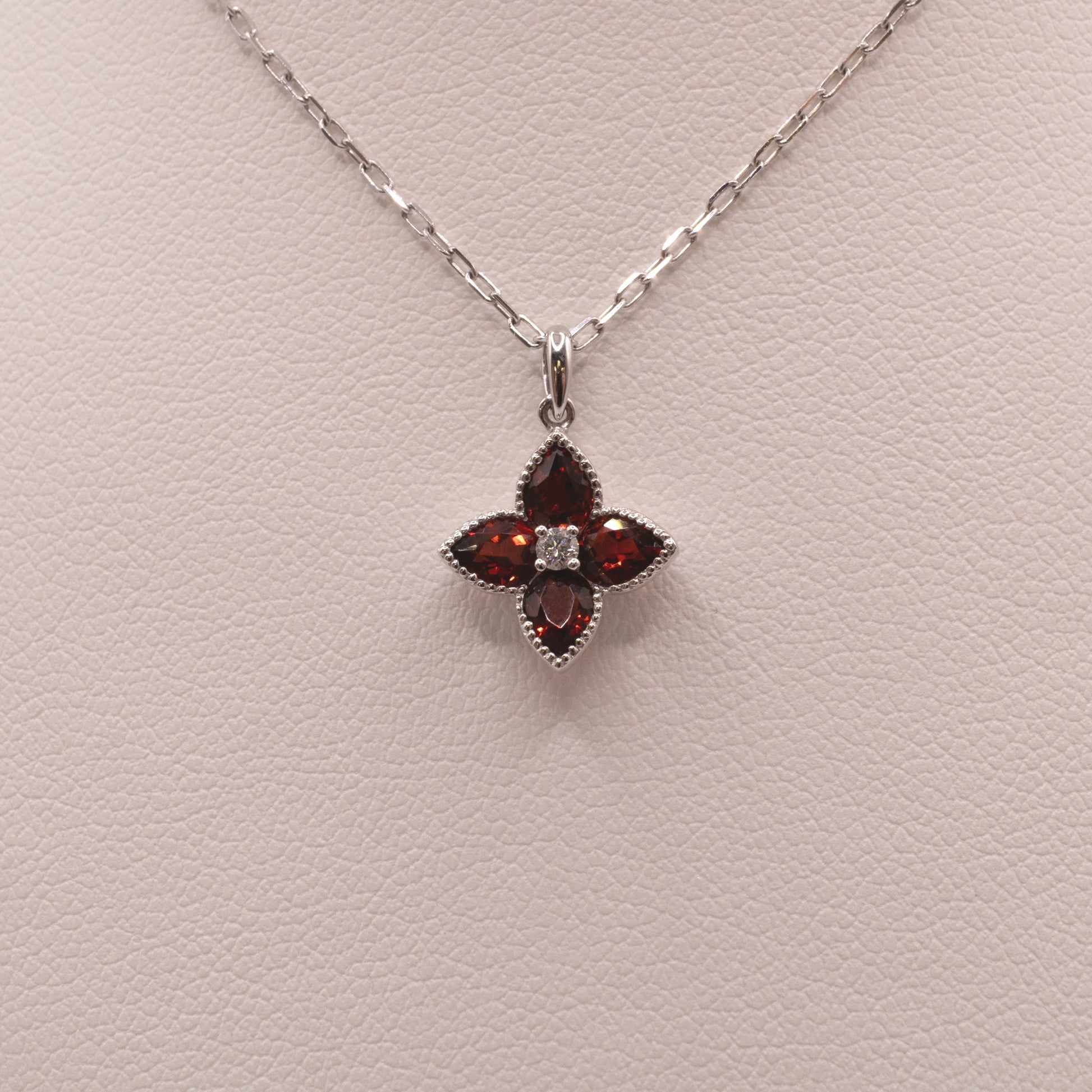 14KWG Garnet and Diamond Flower Necklace