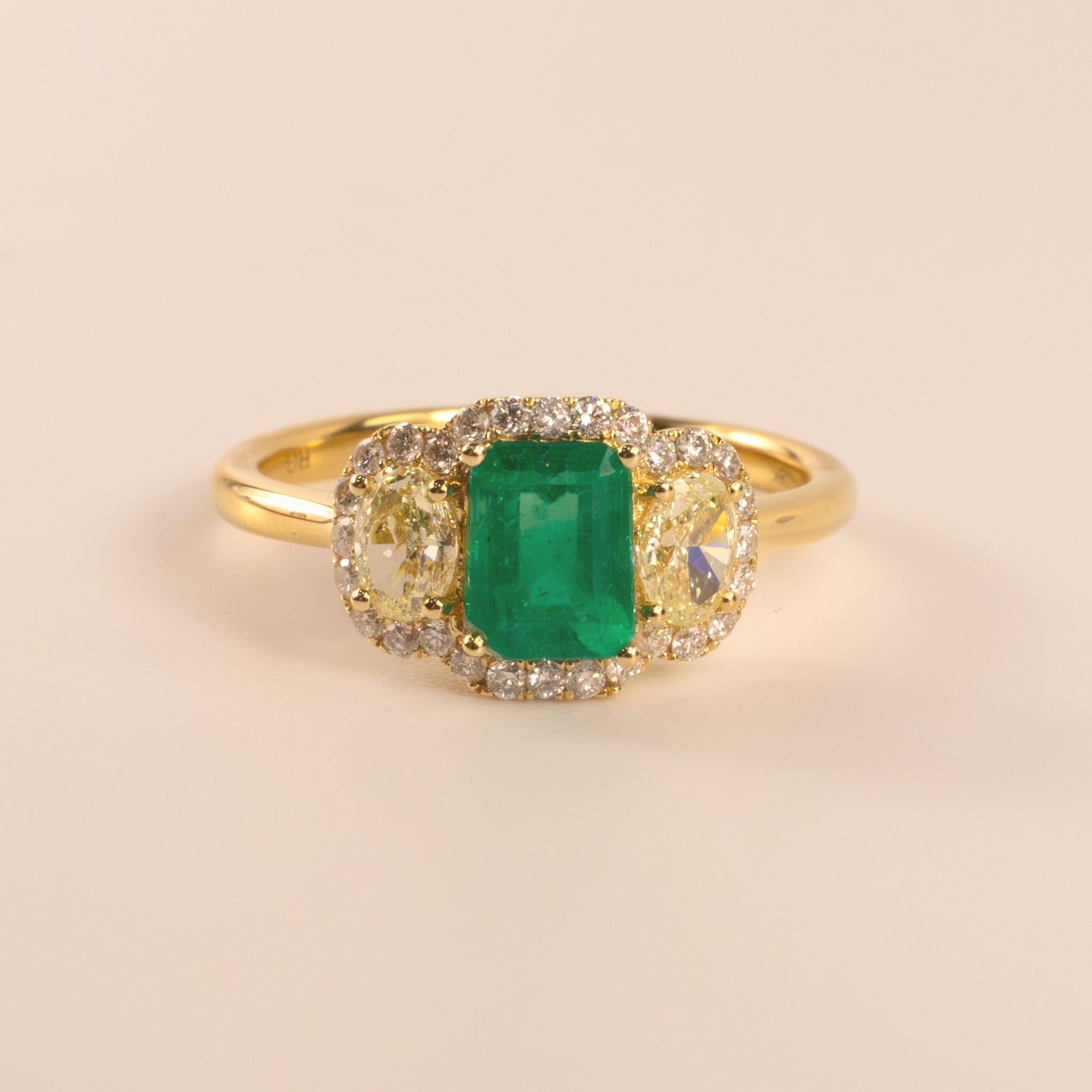 18KYG Emerald and Yellow Diamond Three Stone Ring