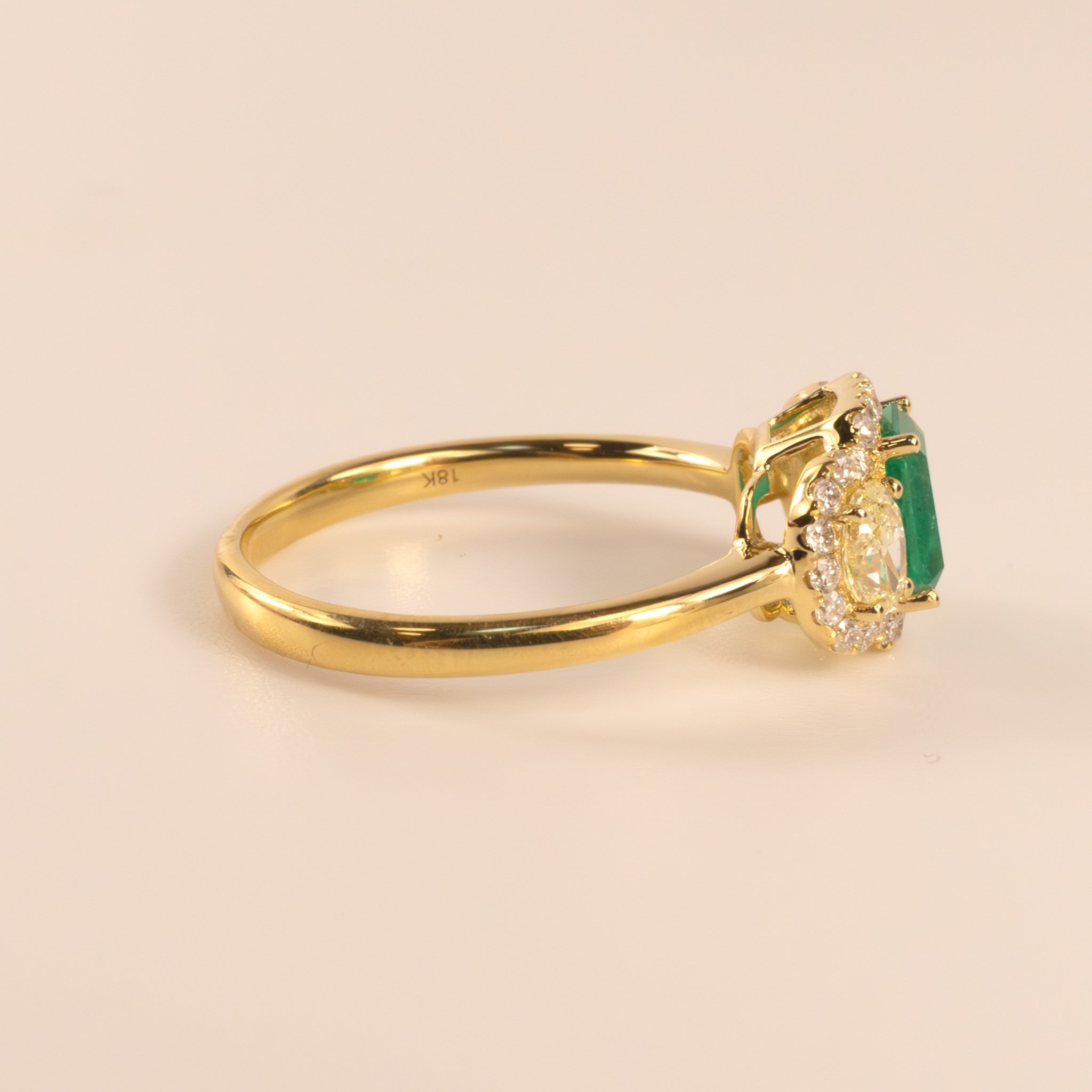 18KYG Emerald and Yellow Diamond Three Stone Ring