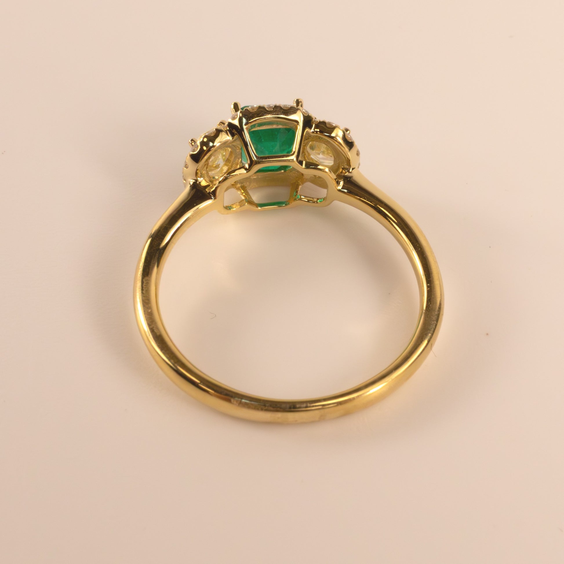 18KYG Emerald and Yellow Diamond Three Stone Ring