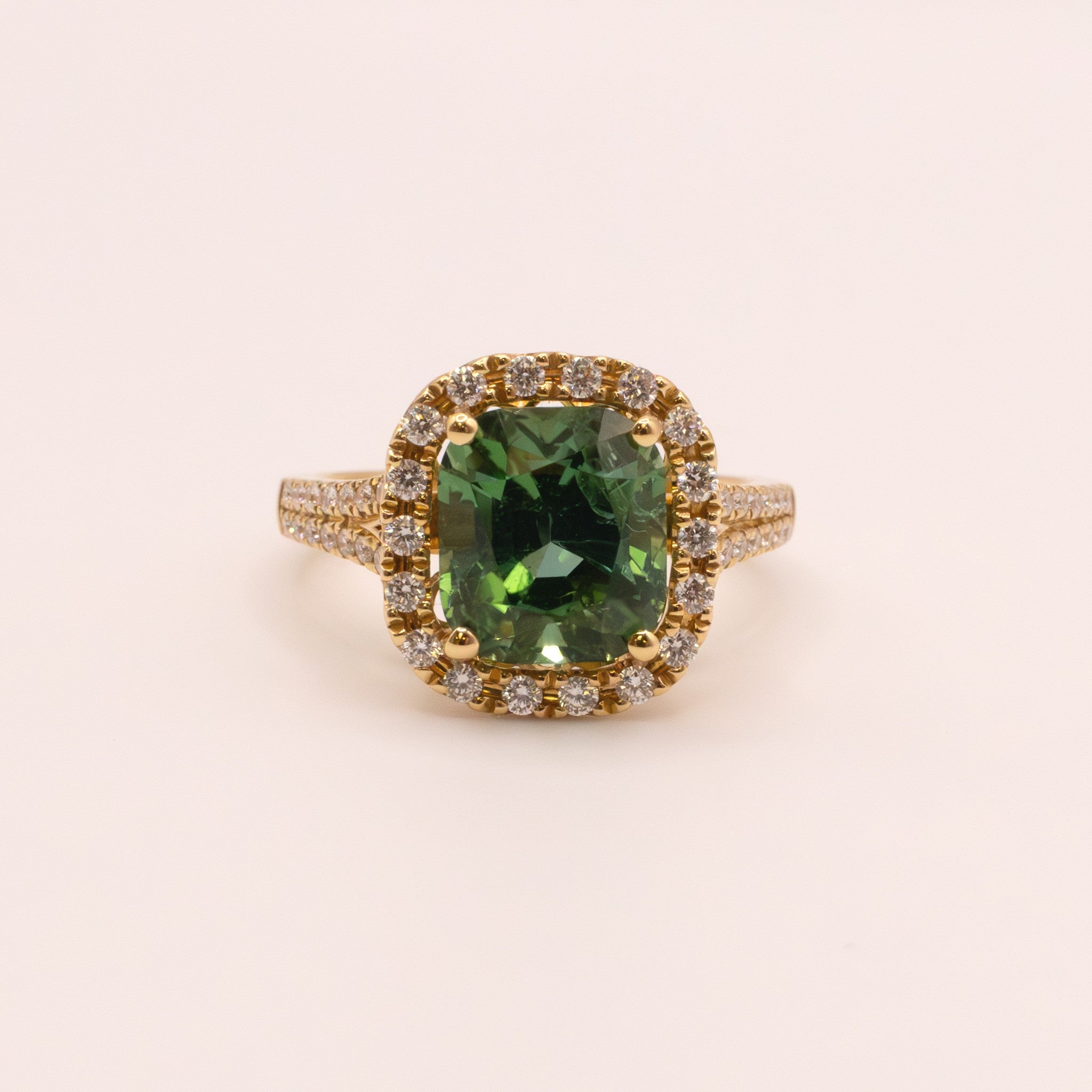 18KYG Green Tourmaline and Diamond Halo Ring
