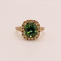 18KYG Green Tourmaline and Diamond Halo Ring