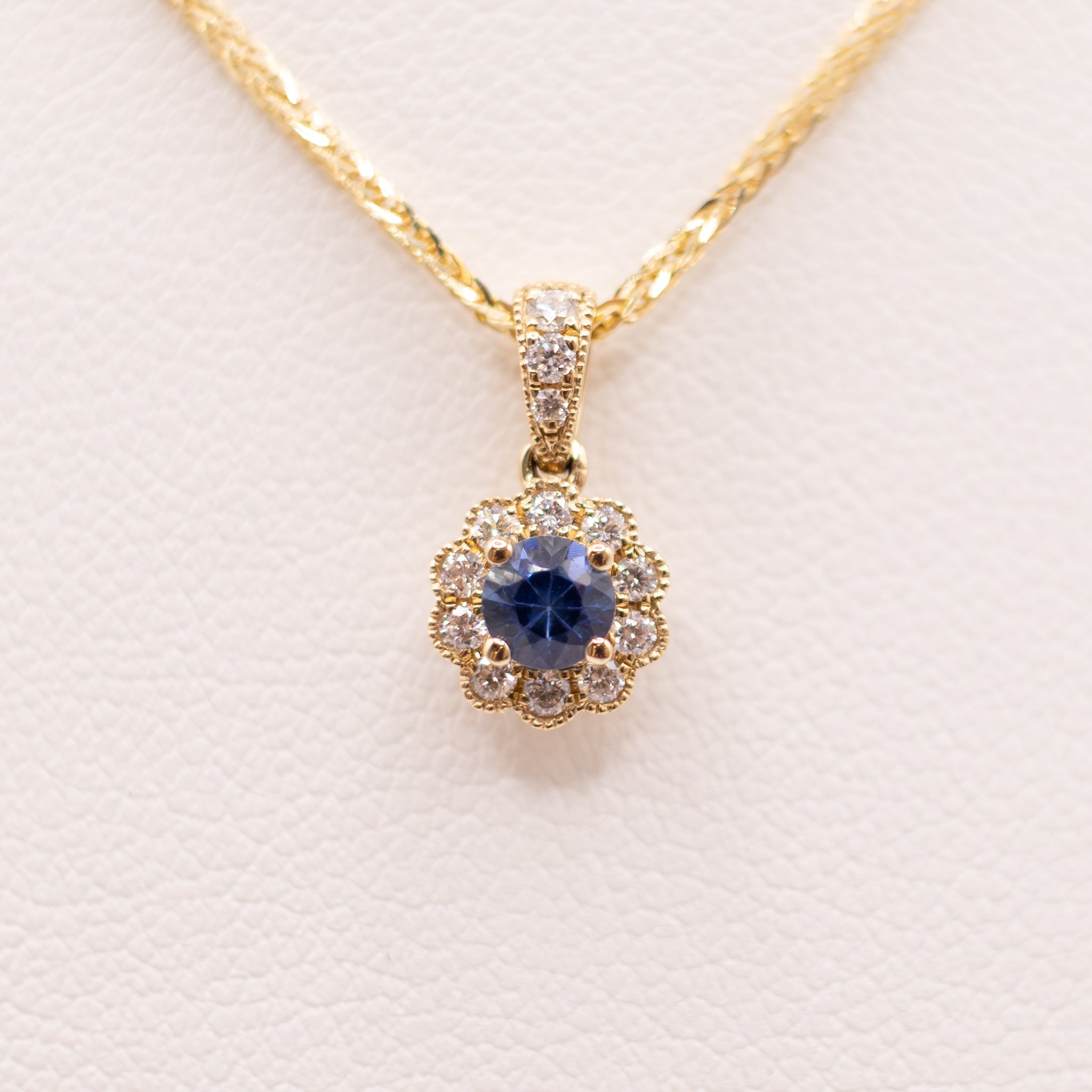 14KYG Blue Sapphire and Diamond Flower Halo Pendant