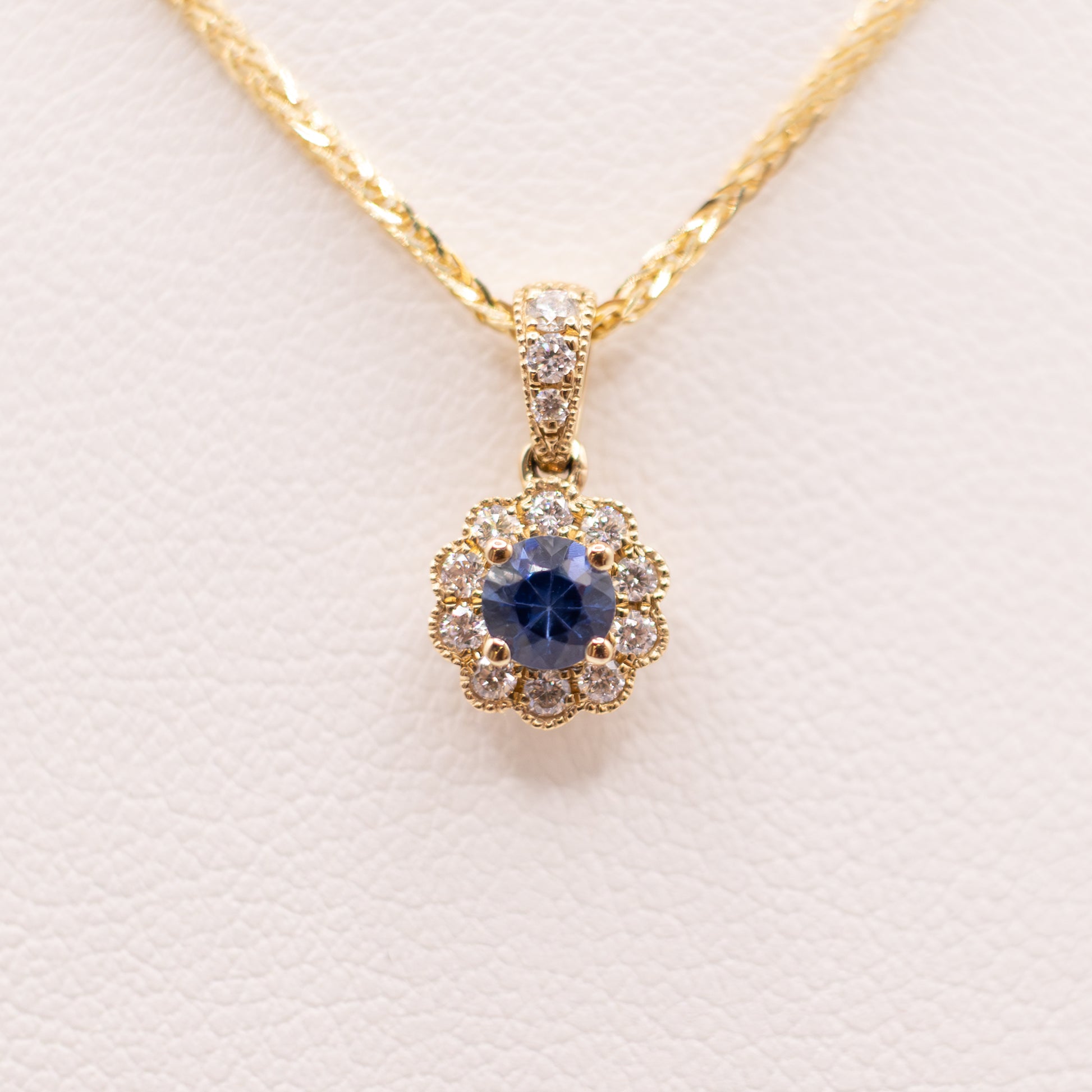 14KYG Blue Sapphire and Diamond Flower Halo Pendant