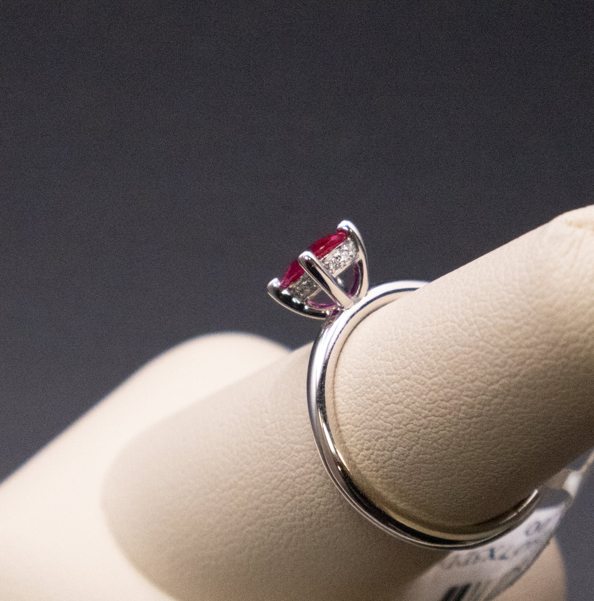 14KWG Ruby Oval with Hidden Diamond Halo Ring