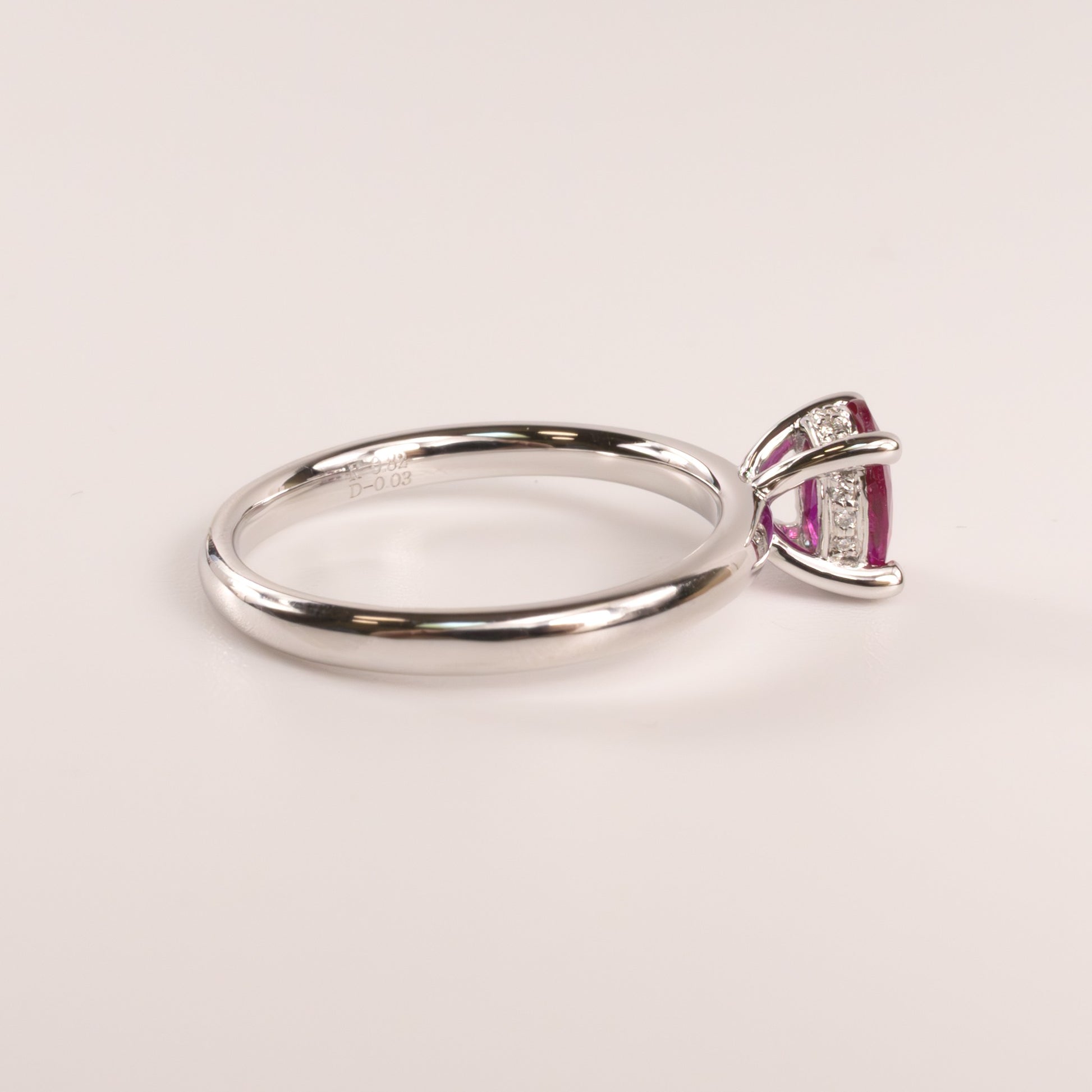 14KWG Ruby Oval with Hidden Diamond Halo Ring