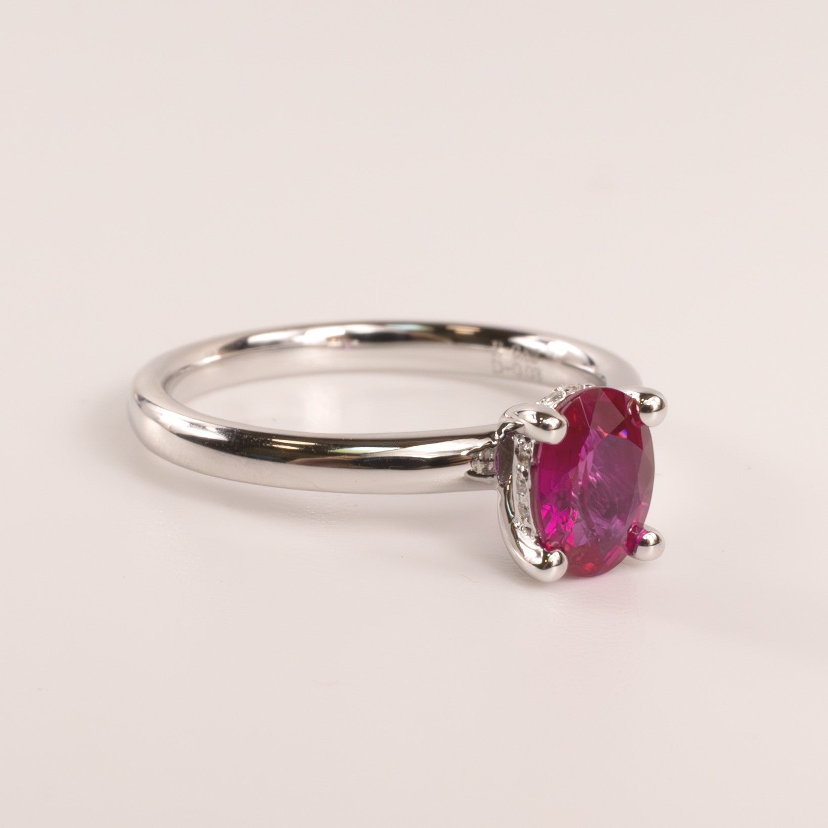 14KWG Ruby Oval with Hidden Diamond Halo Ring