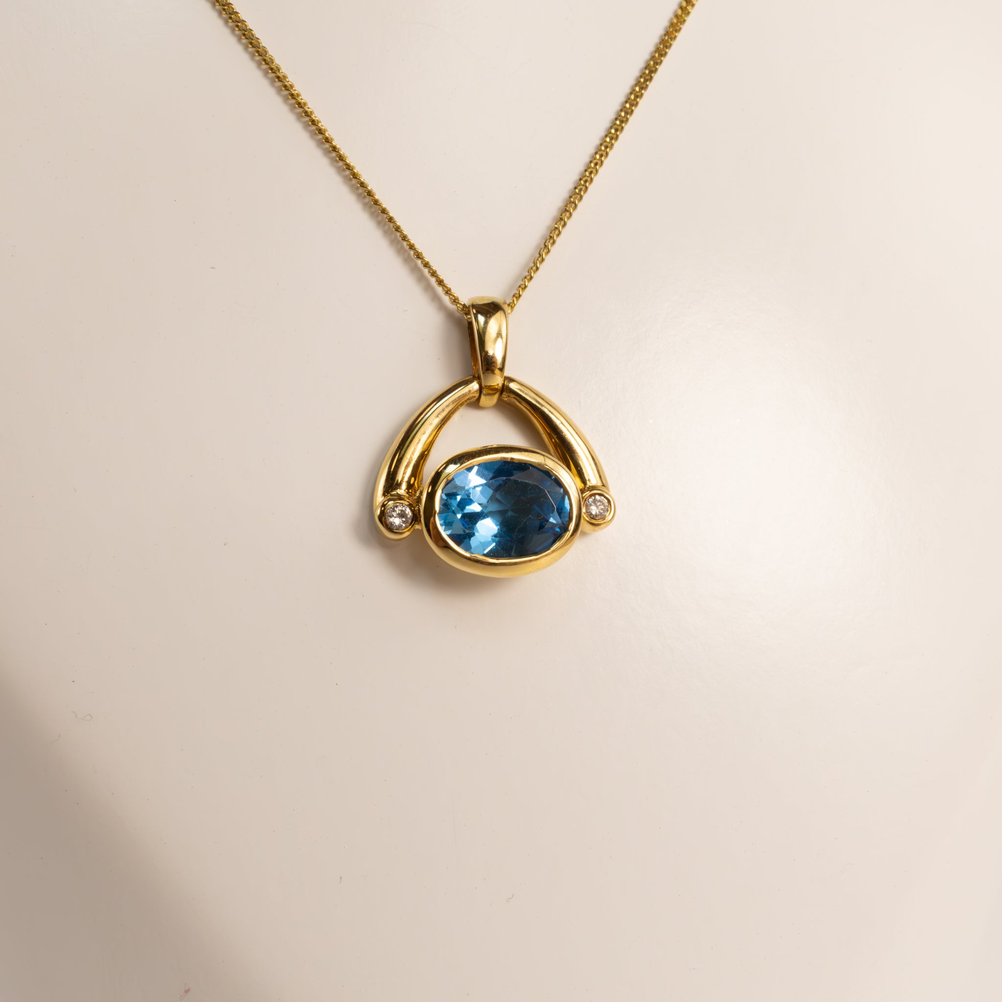 18KYG Blue Topaz Bezel Set with Diamond Accents Wishbone Necklace