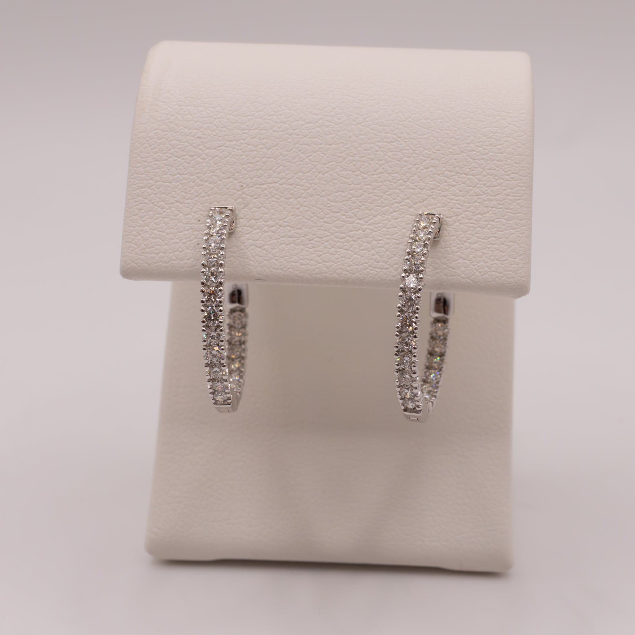 14KWG Diamond 0.70ctw In-and-Out Hoop Earrings