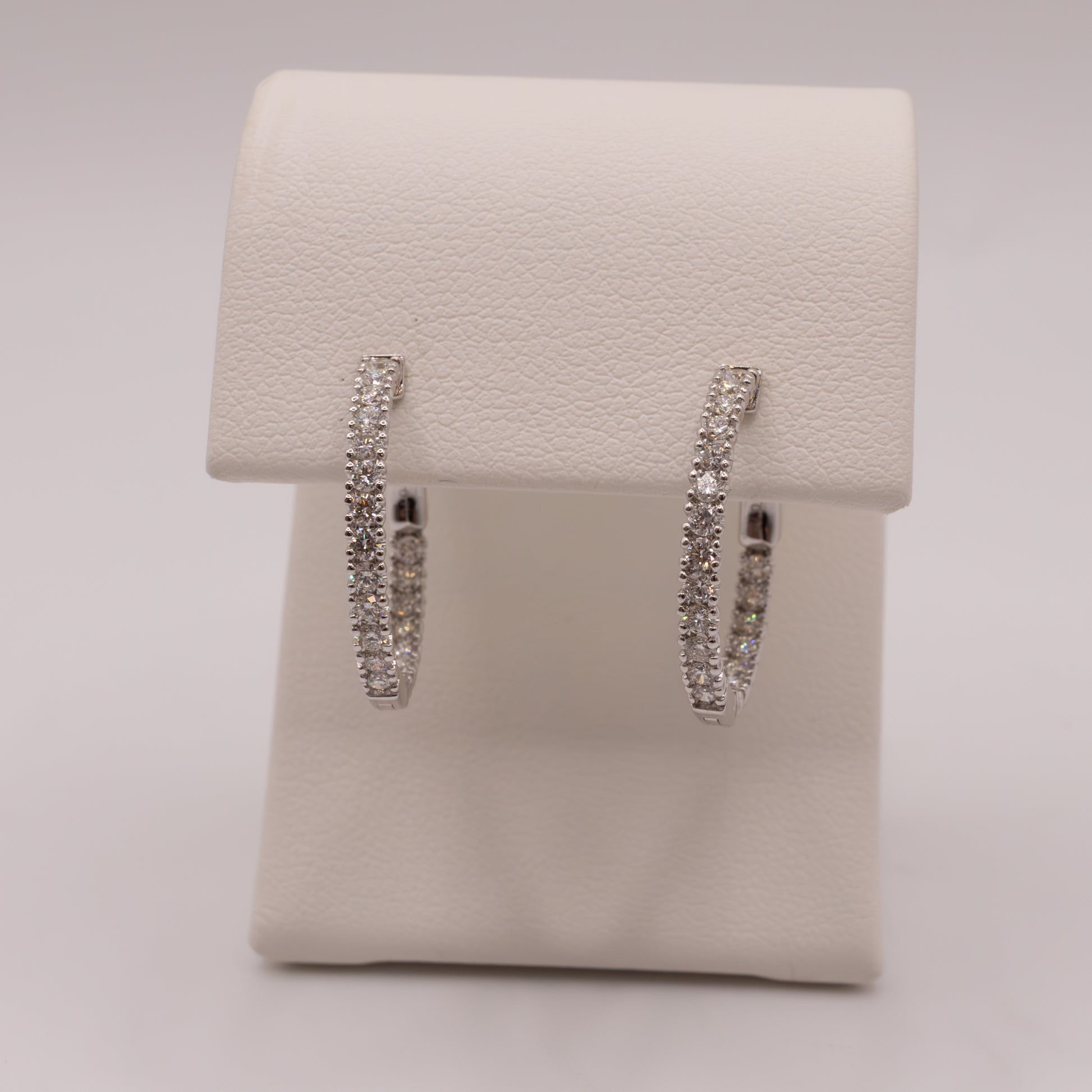 14KWG Diamond 0.70ctw In-and-Out Hoop Earrings