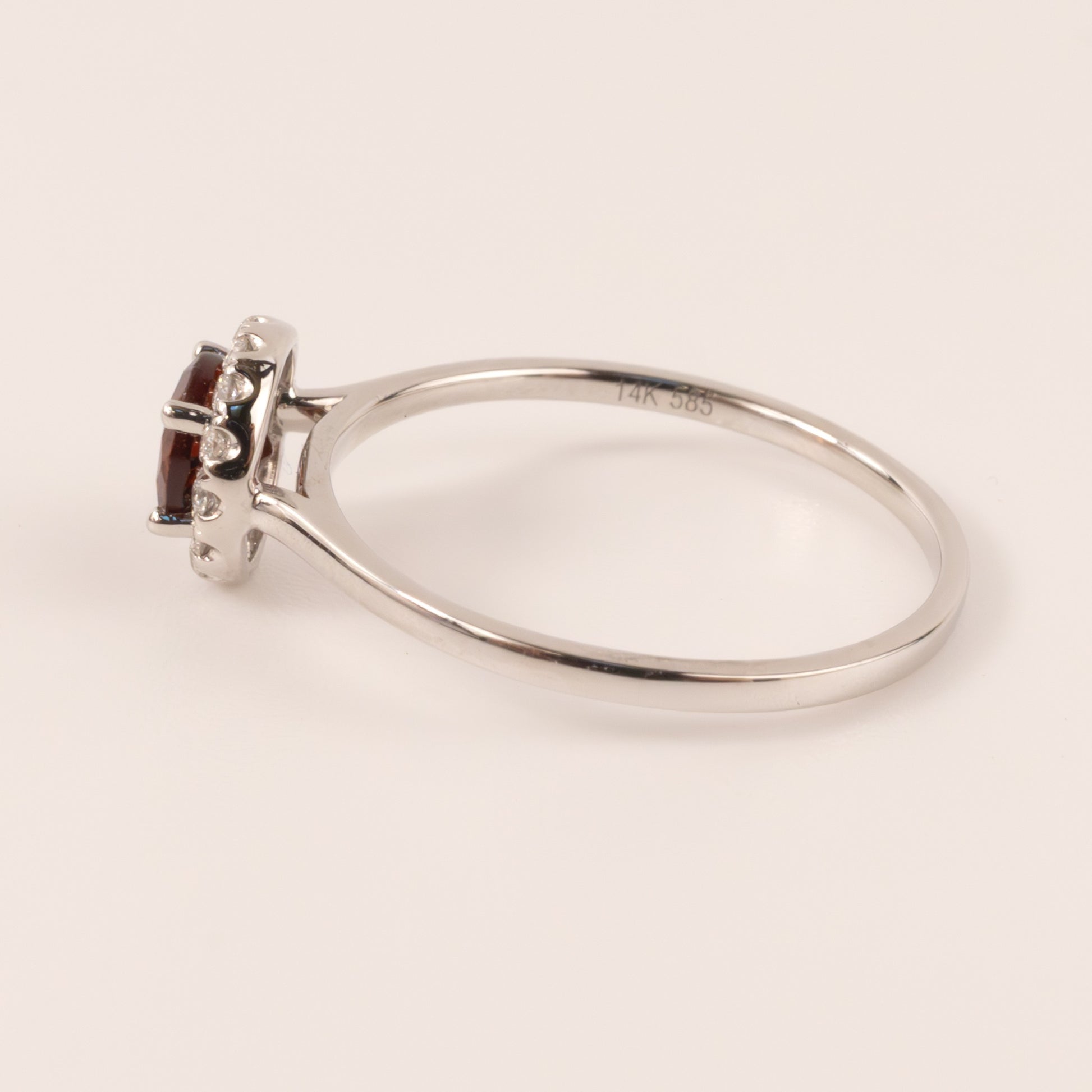 14KWG Round Garnet and Diamond Halo Ring