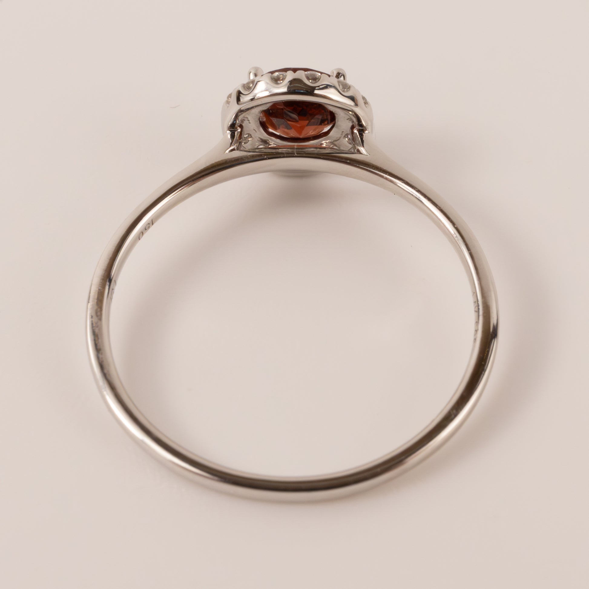 14KWG Round Garnet and Diamond Halo Ring