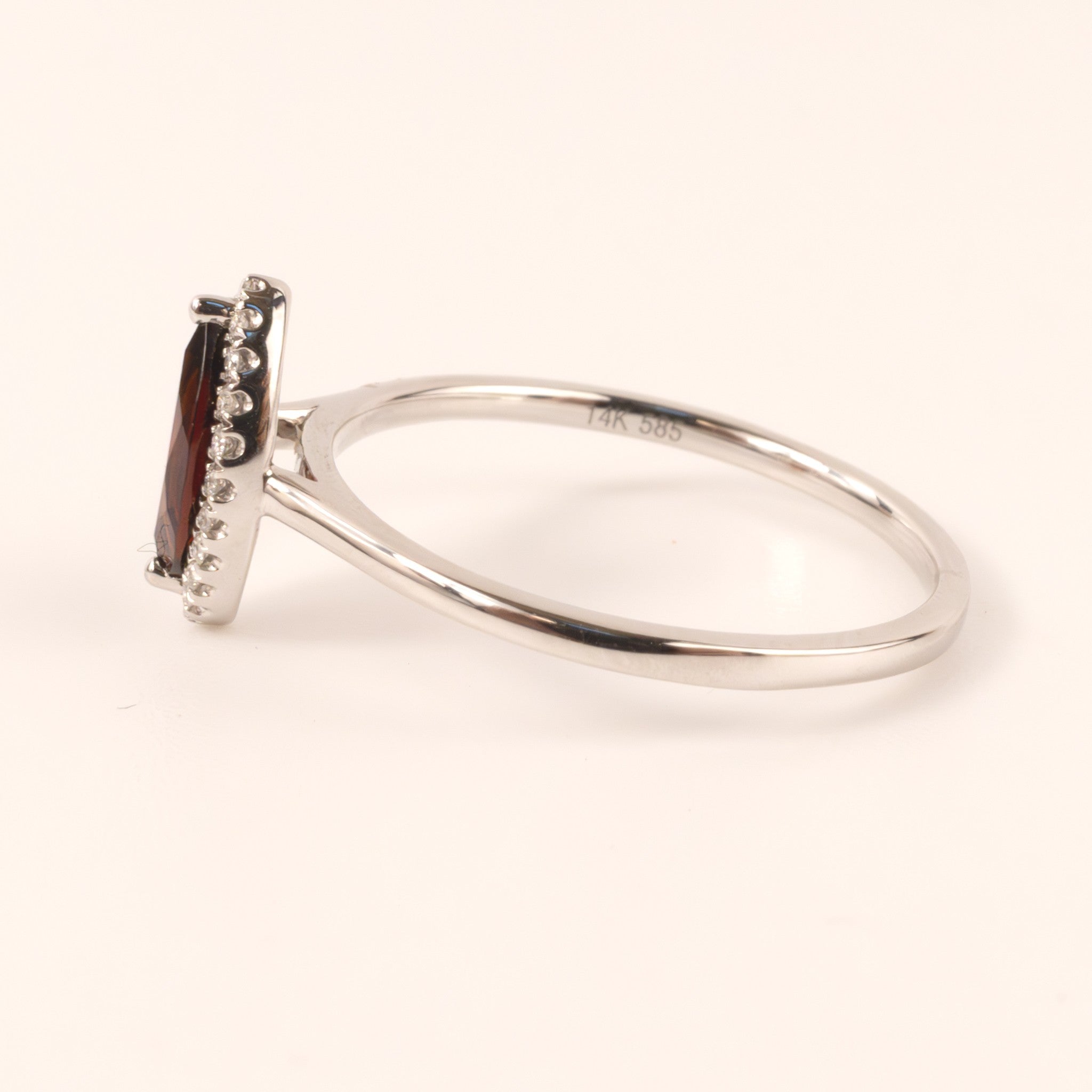 14KWG Garnet Marquise and Diamond Halo Ring