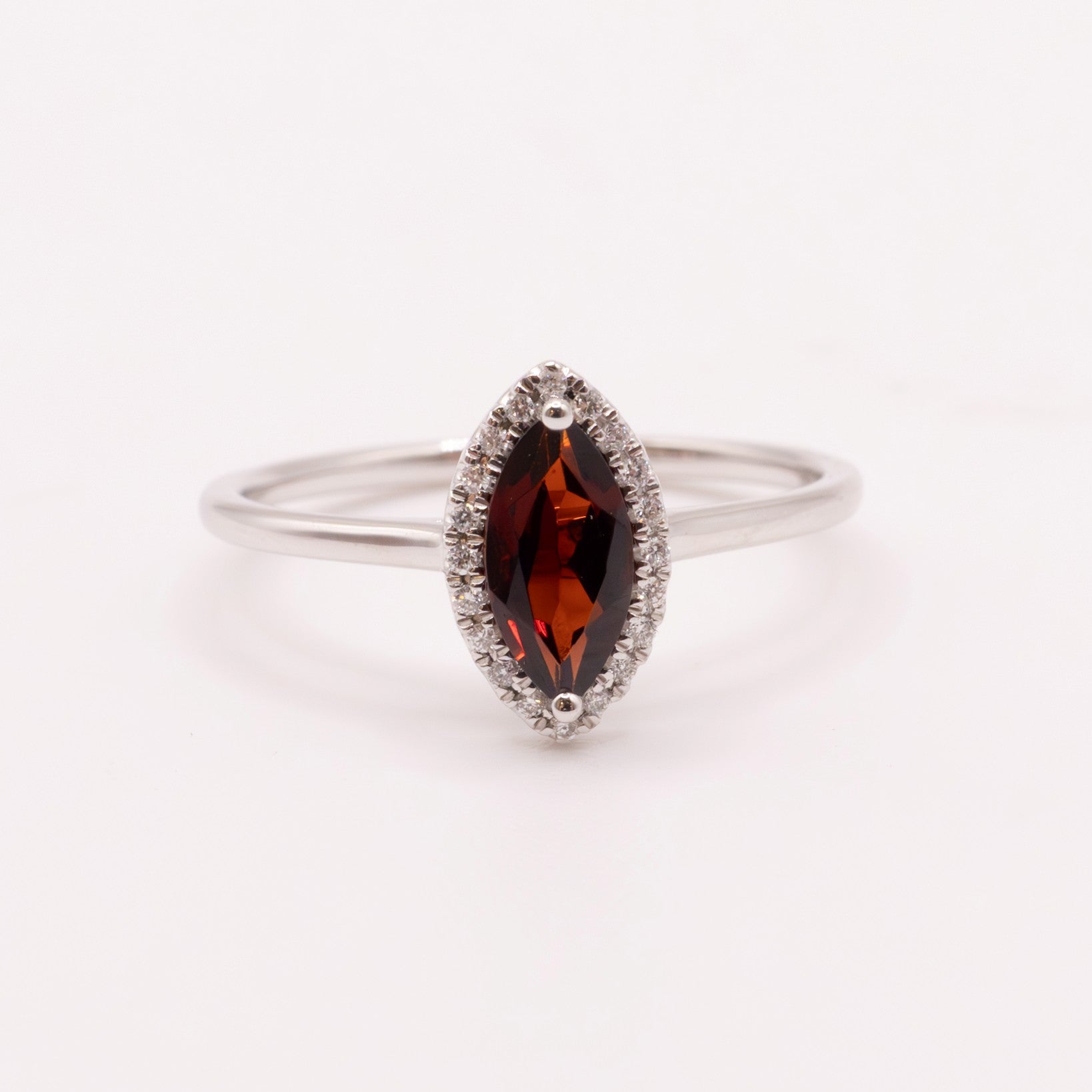 14KWG Garnet Marquise and Diamond Halo Ring