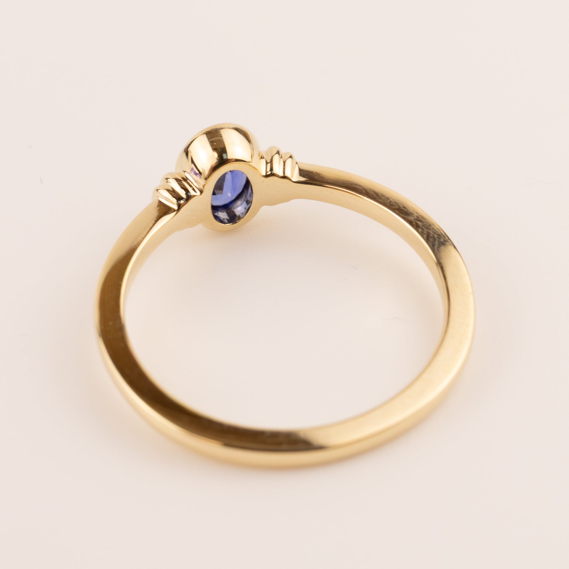 14KYG Blue Sapphire Oval Bezel Set Ring