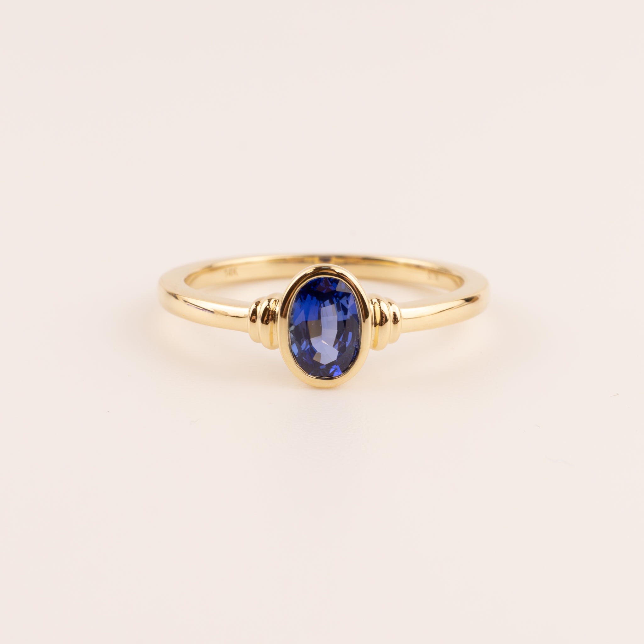 14KYG Blue Sapphire Oval Bezel Set Ring