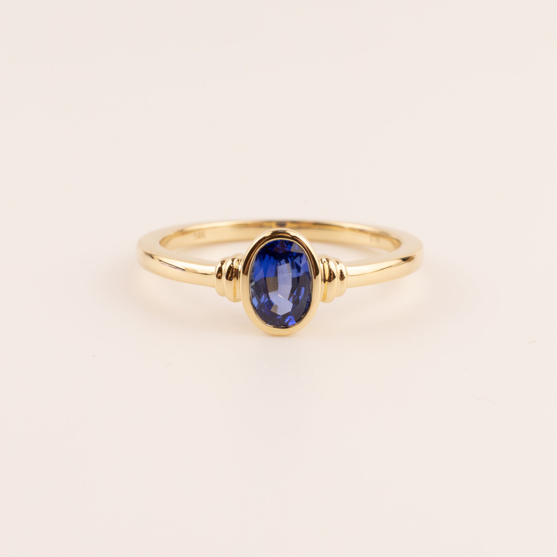 14KYG Blue Sapphire Oval Bezel Set Ring
