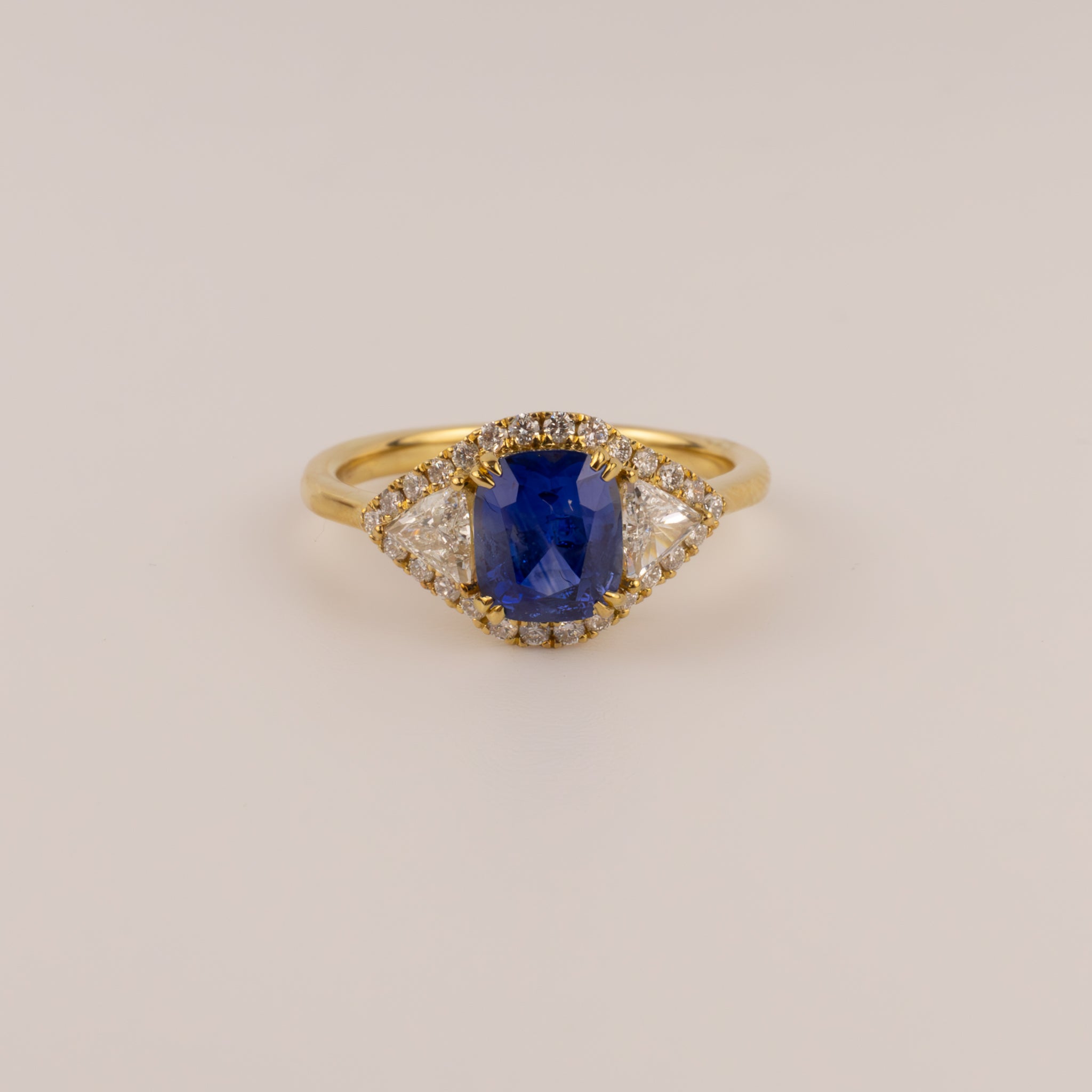 18KYG Sapphire and Diamond Trillion and Halo Ring