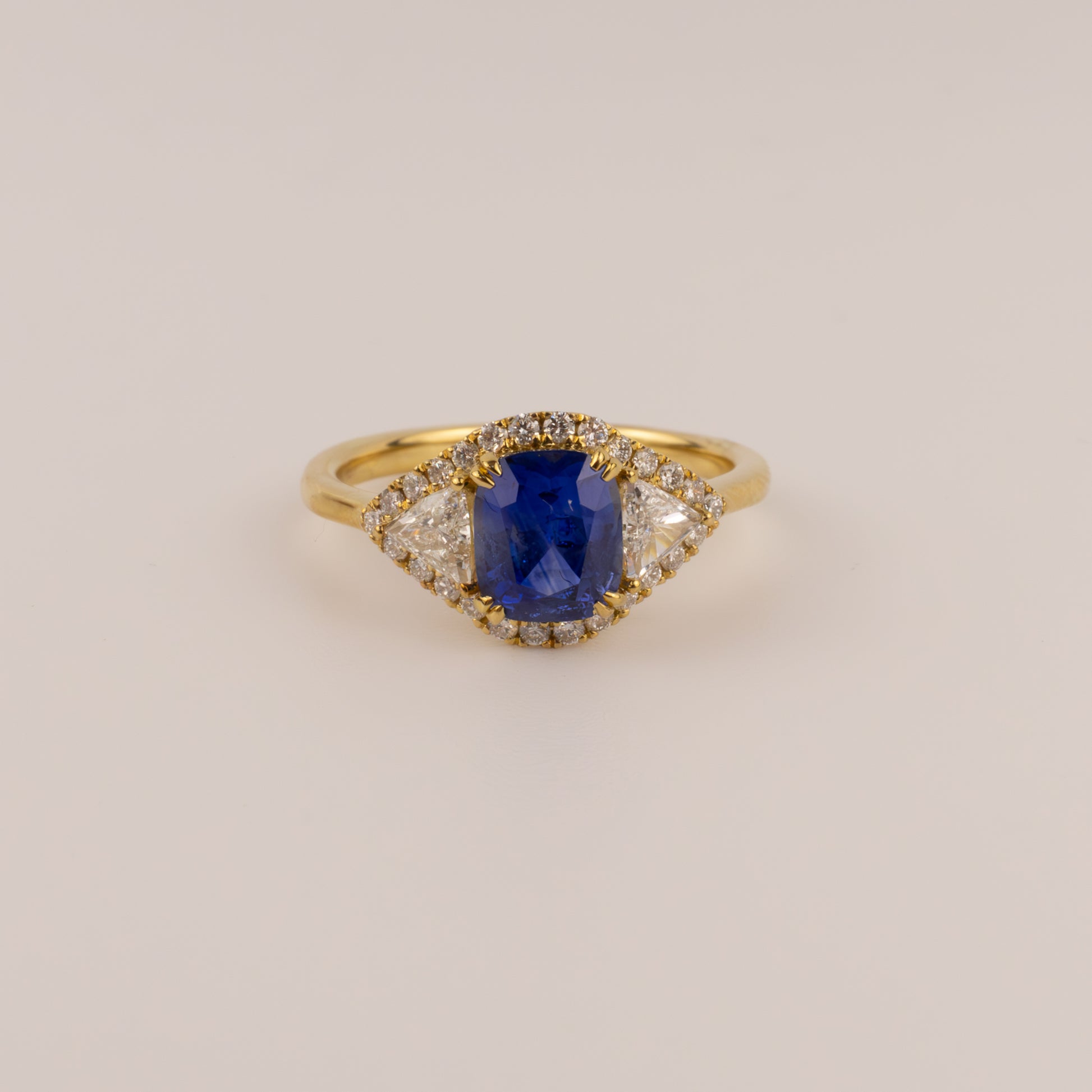 18KYG Sapphire and Diamond Trillion and Halo Ring