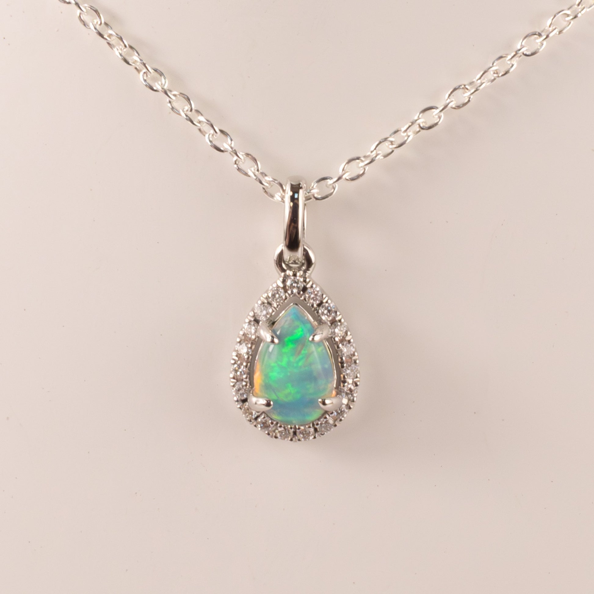 14KWG Opal Pear and Diamond Halo Pendant