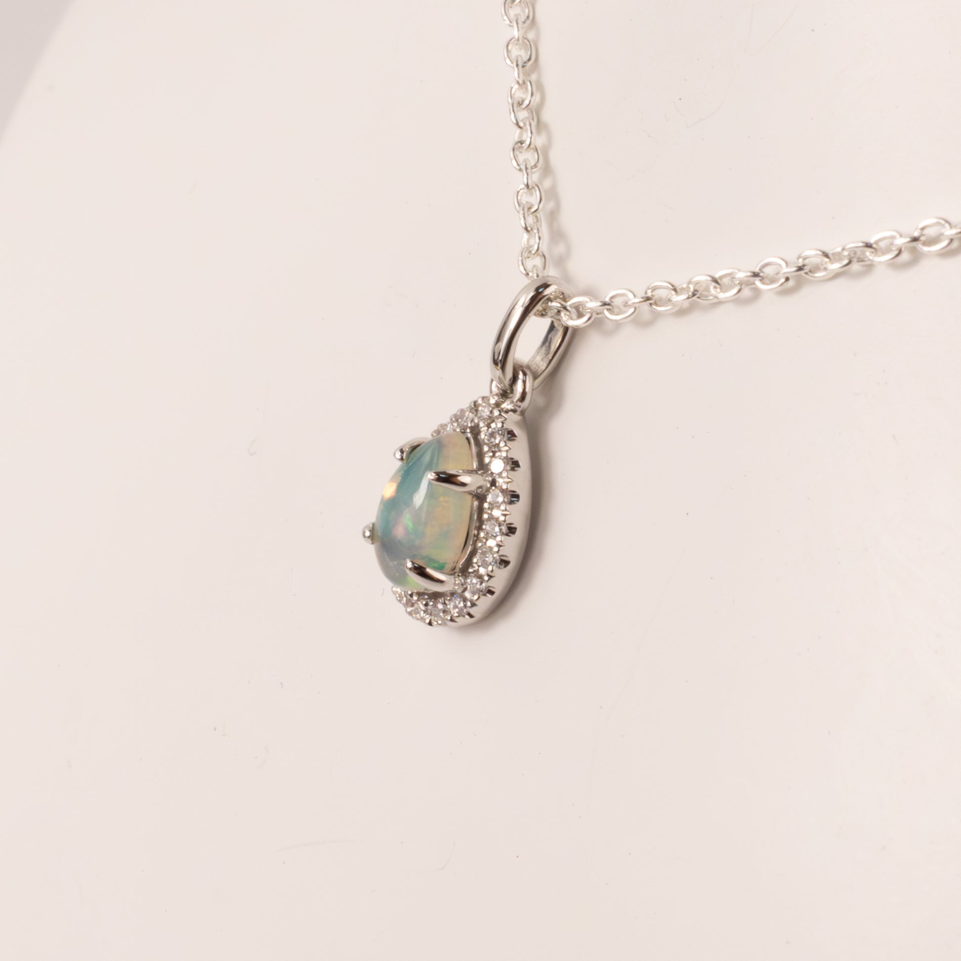 14KWG Opal Pear and Diamond Halo Pendant
