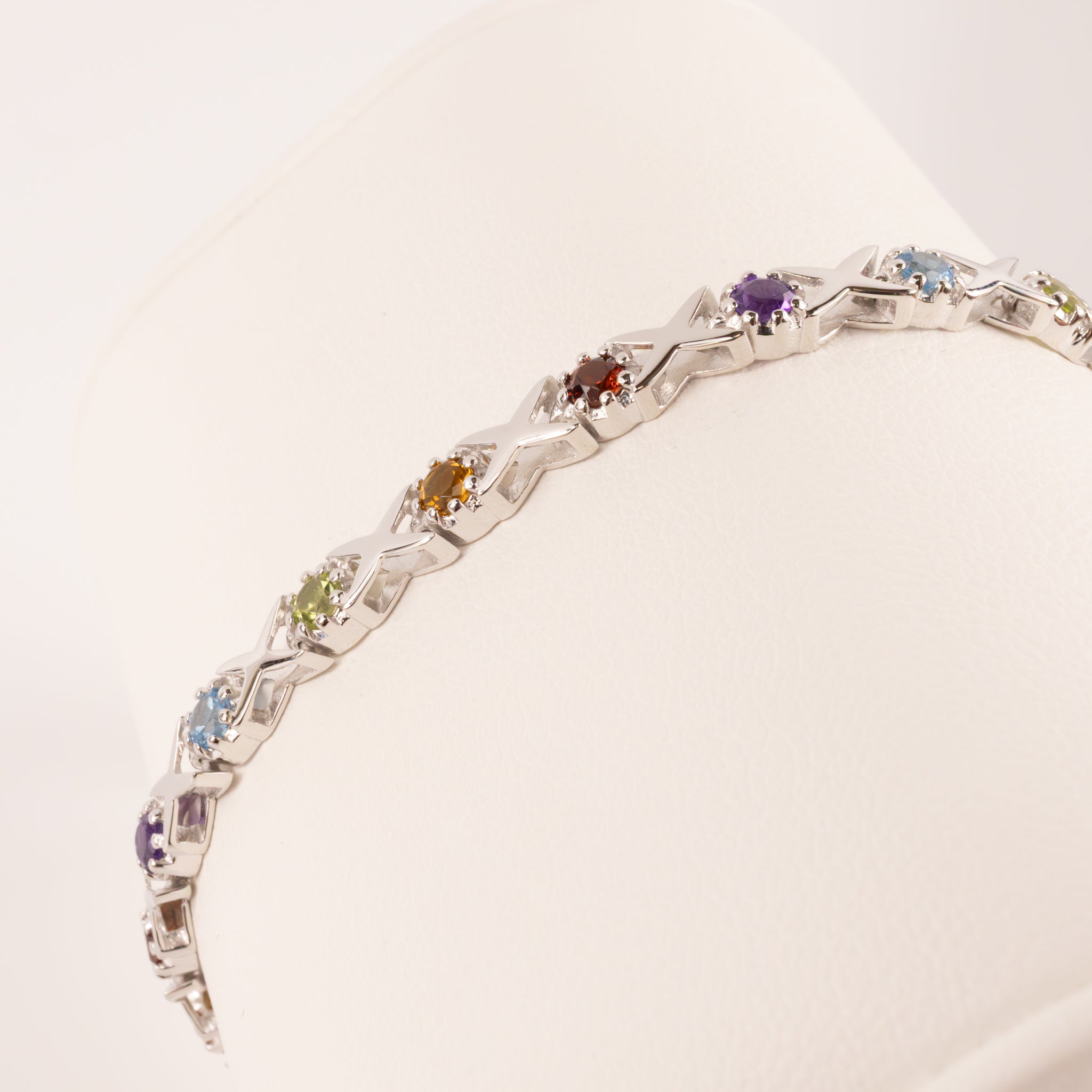 Sterling Silver Topaz, Citrine , Amethyst, Peridot, and Garnet Cross Stich Bracelet
