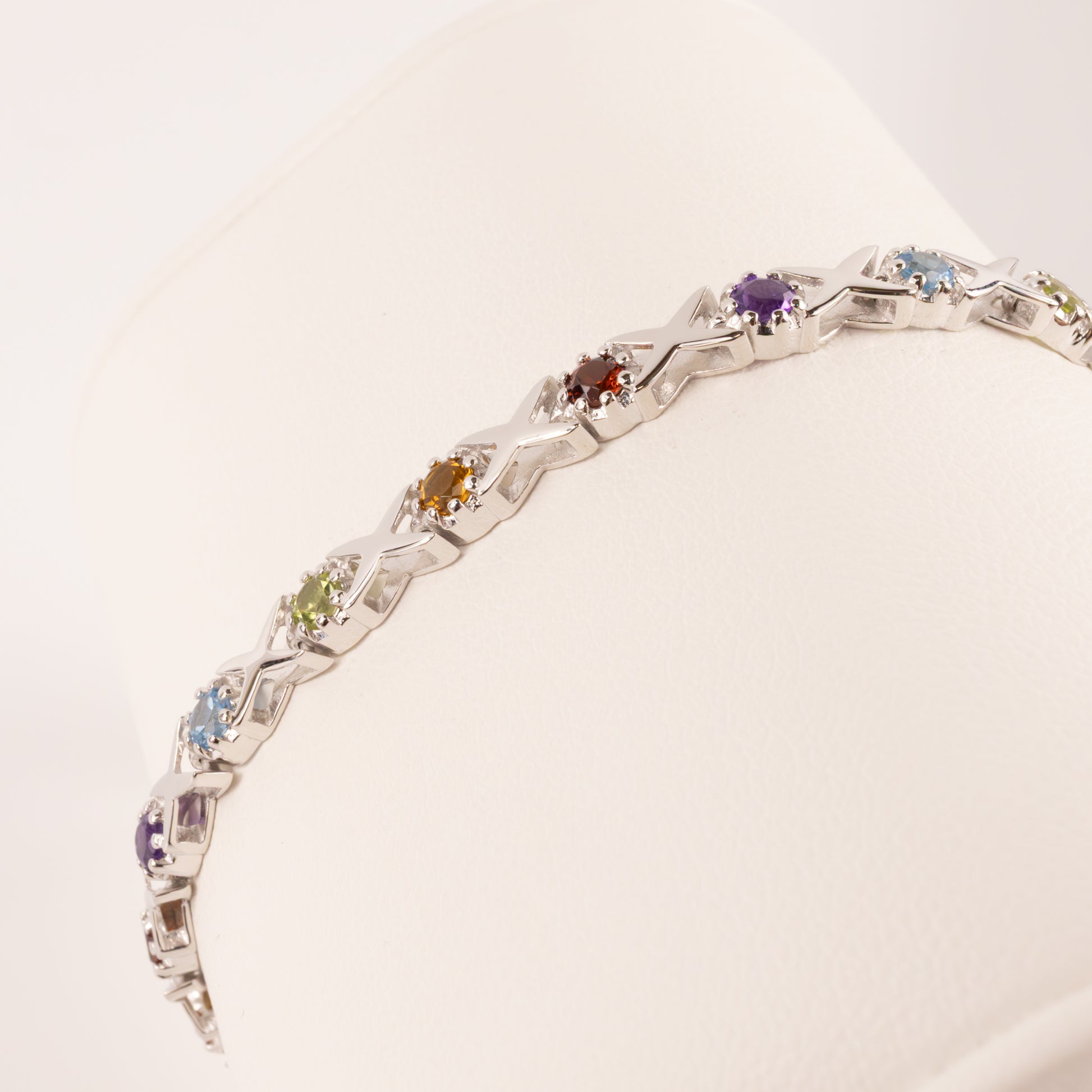 Sterling Silver Topaz, Citrine , Amethyst, Peridot, and Garnet Cross Stich Bracelet