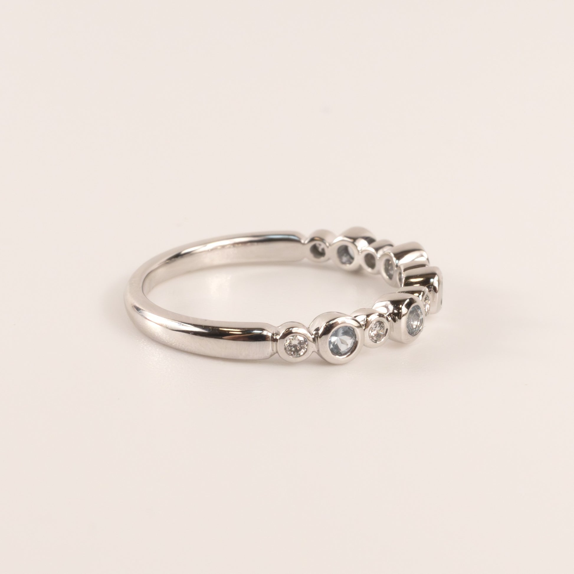14KWG Aquamarine 0.20cttw and Diamond 0.09cttw Alternating Bezel Set Band