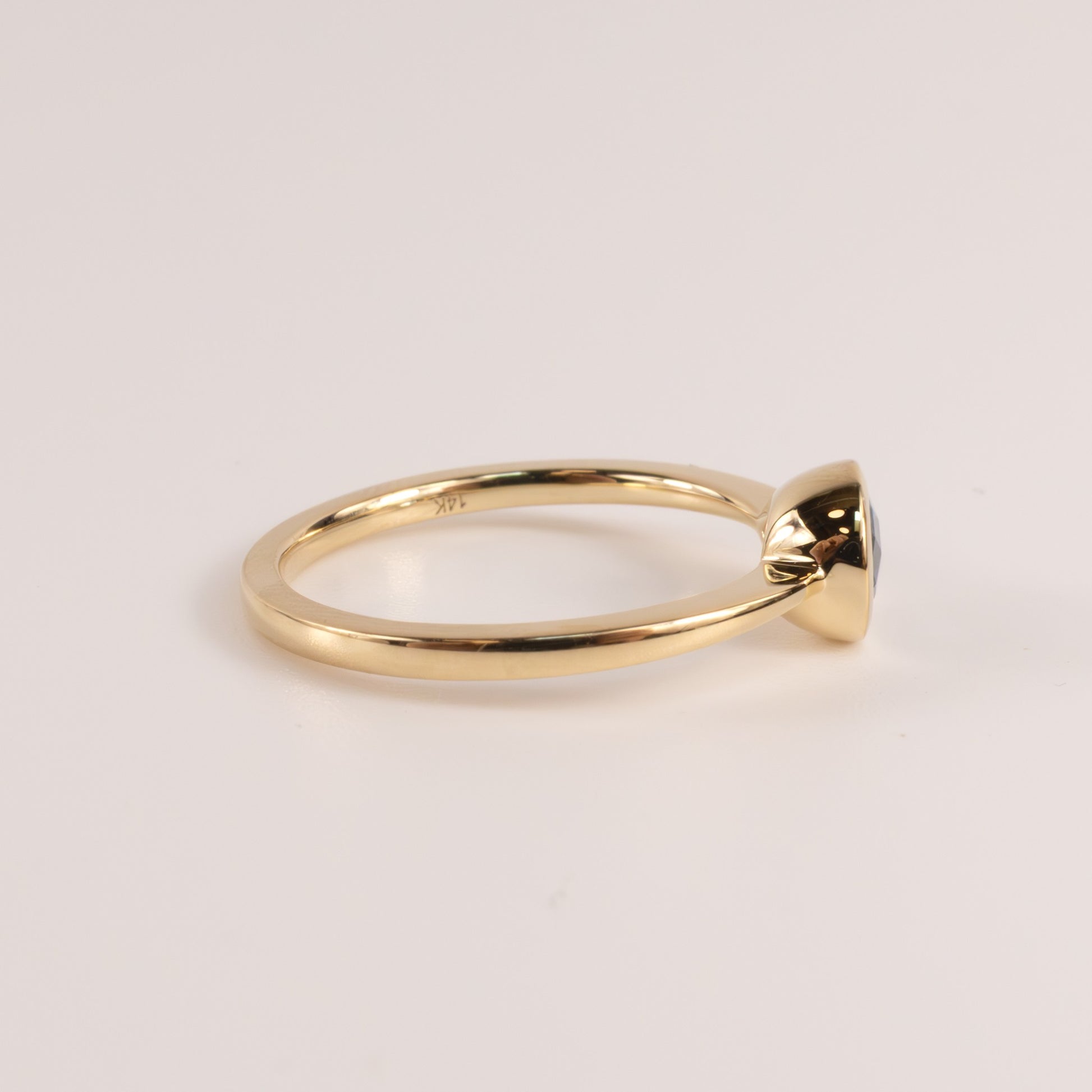 14KYG London Blue Topaz Pear Cut East-West Bezel Set Ring