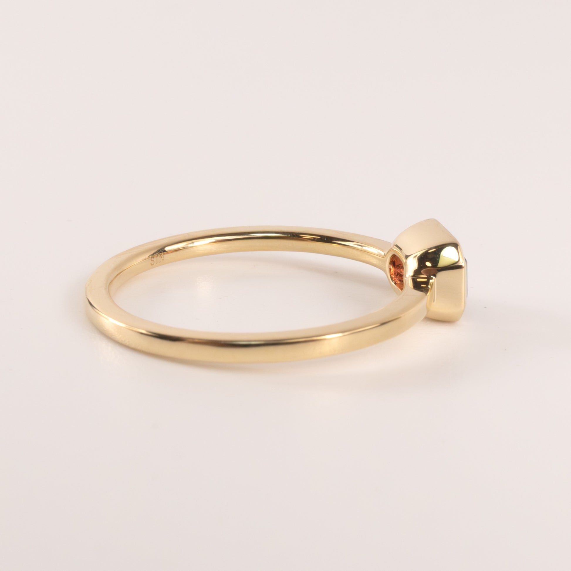 14KYG Garnet Emerald Cut East-West Bezel Set Ring