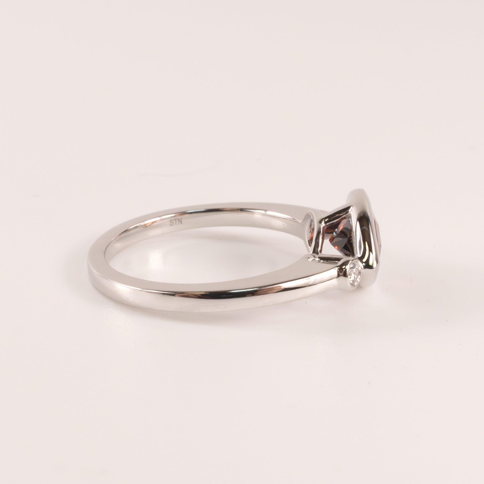 14KWG Garnet Pear and Diamond East-West Bezel Set Ring