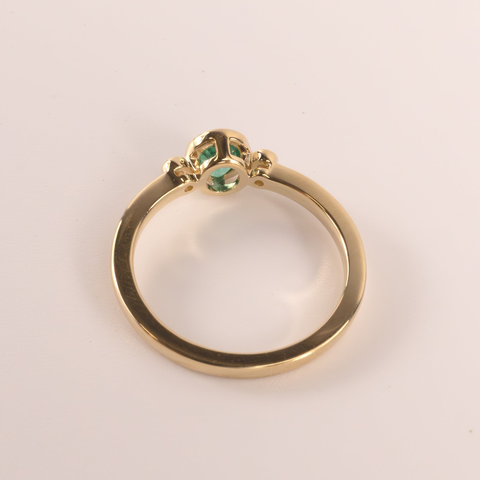 14KYG Emerald Oval and Diamon 3-Stone Bezel Set Ring