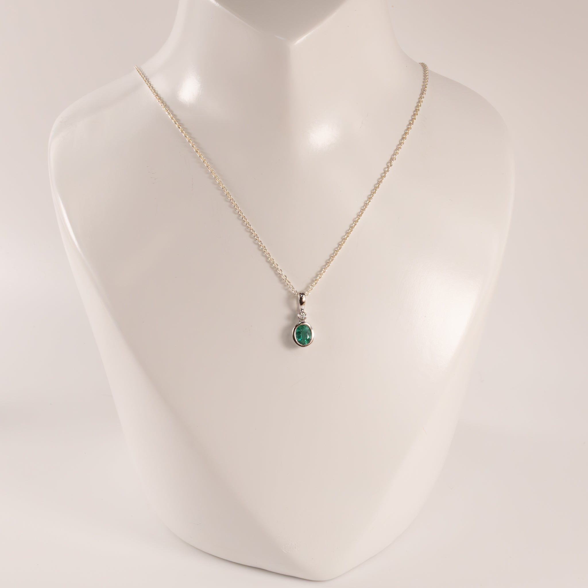 14KWG Emerald Oval and Diamond Bezel Set Pendant