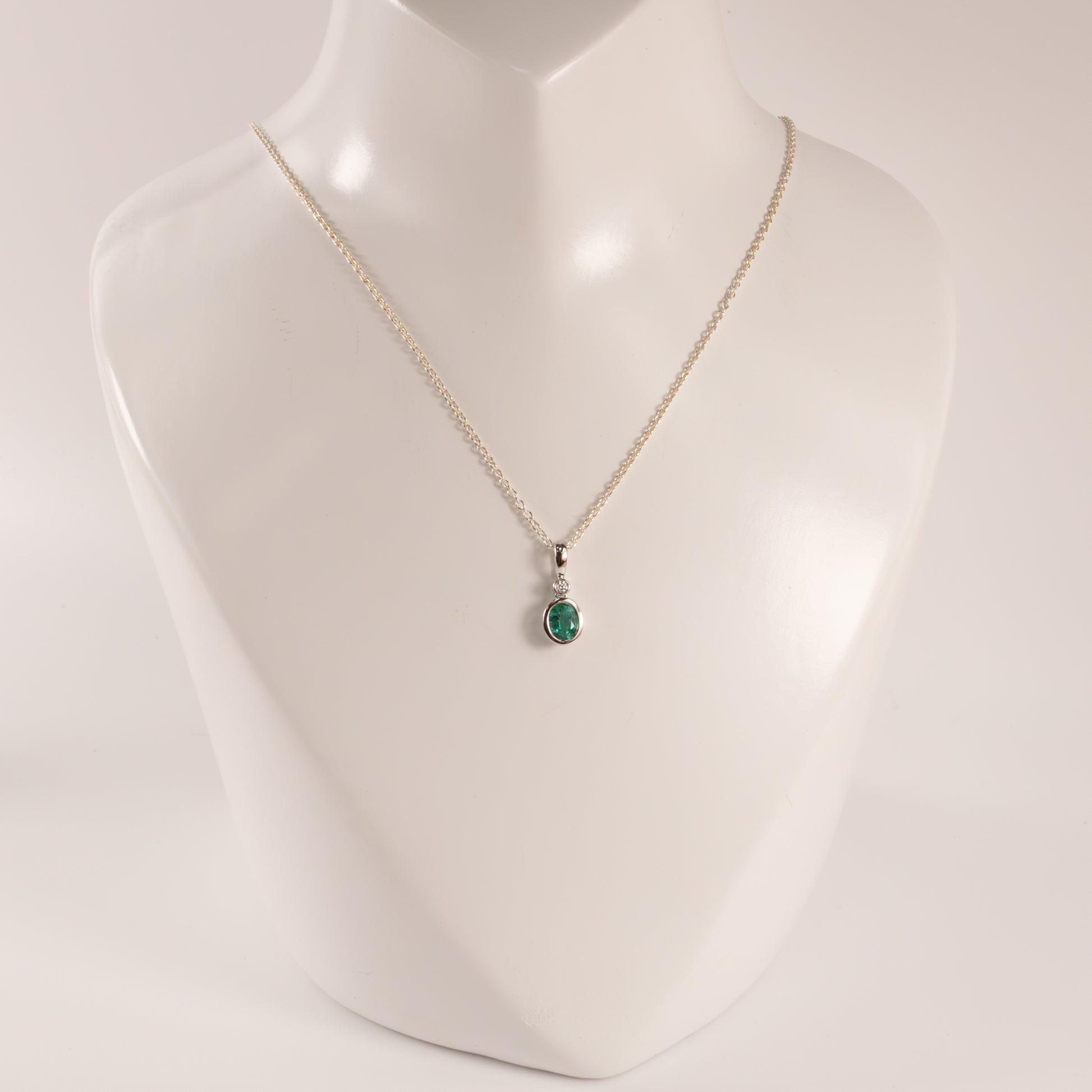 14KWG Emerald Oval and Diamond Bezel Set Pendant
