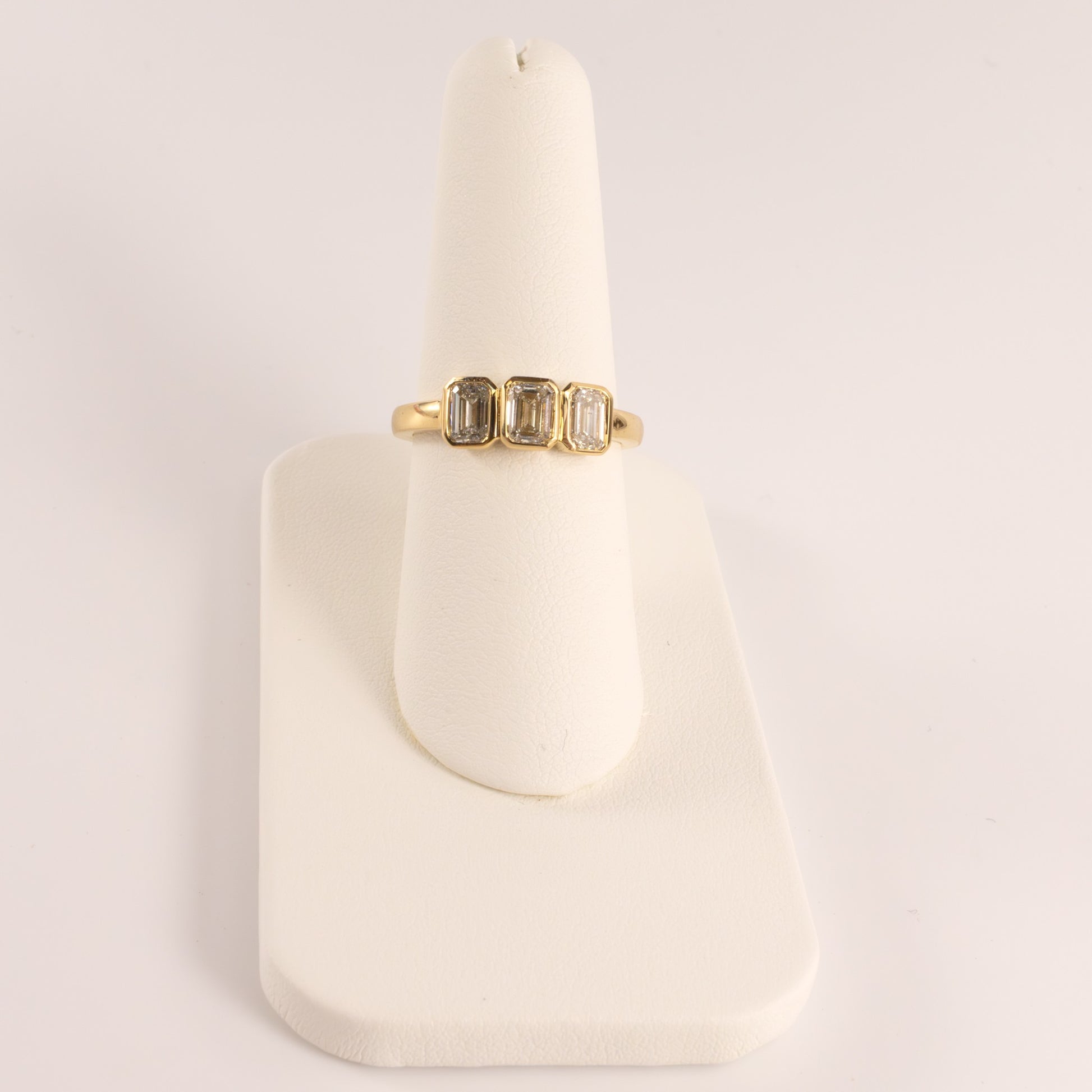 18KYG Diamond 1.25cttw Emerald Cut Bezel Set 3-Stone Ring