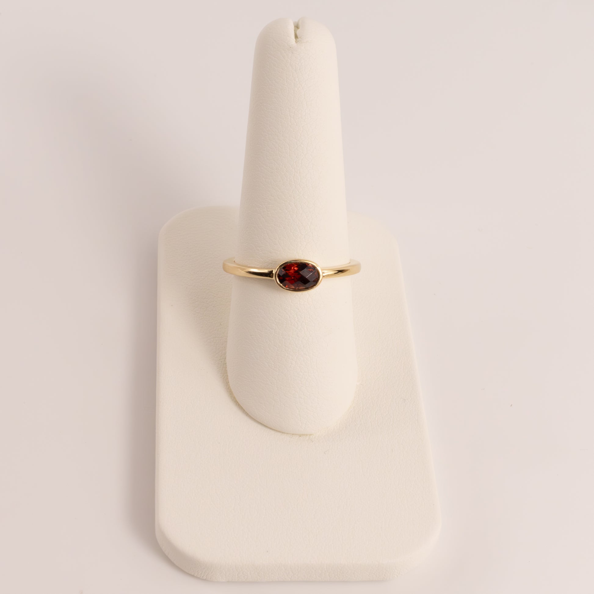 14KYG Garnet Oval Bezel Set East-West Ring