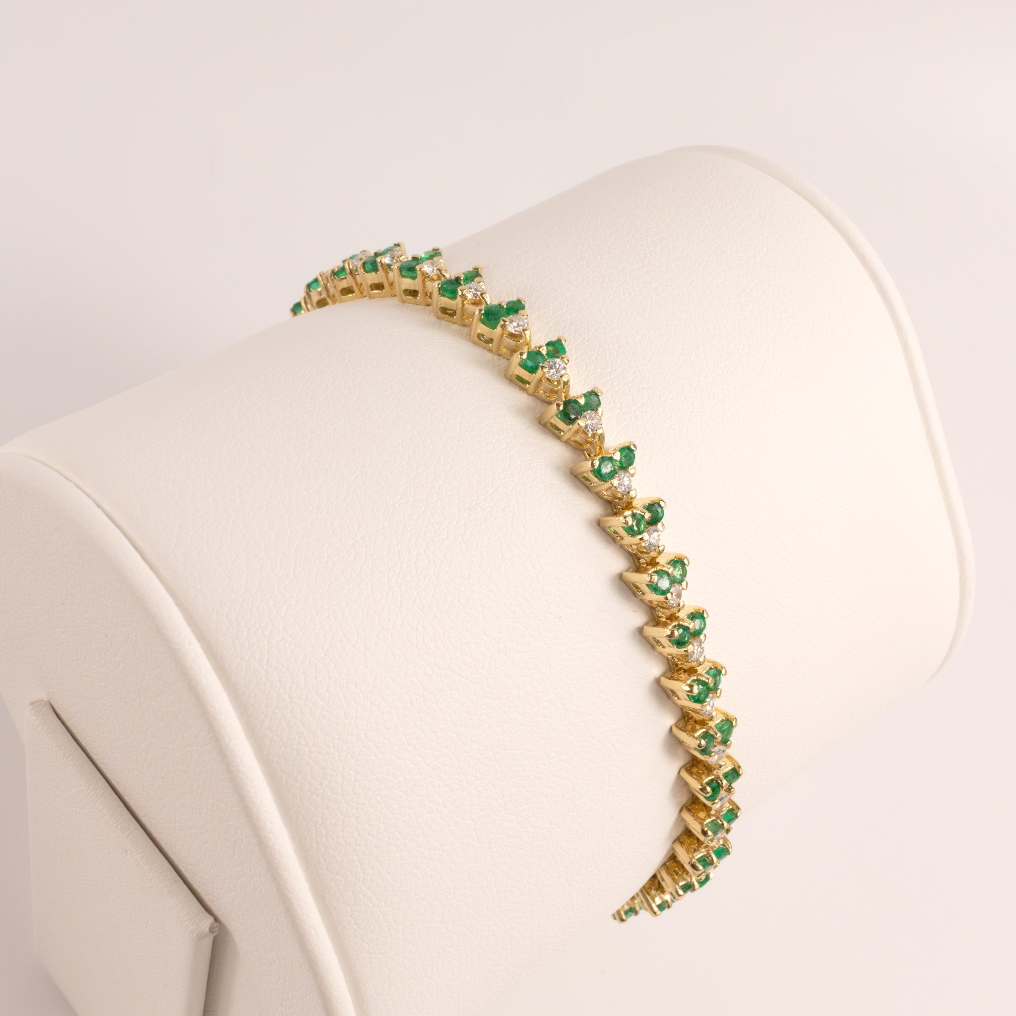 14KYG Emerald and Diamond 3-Stone Link Tennis Bracelet