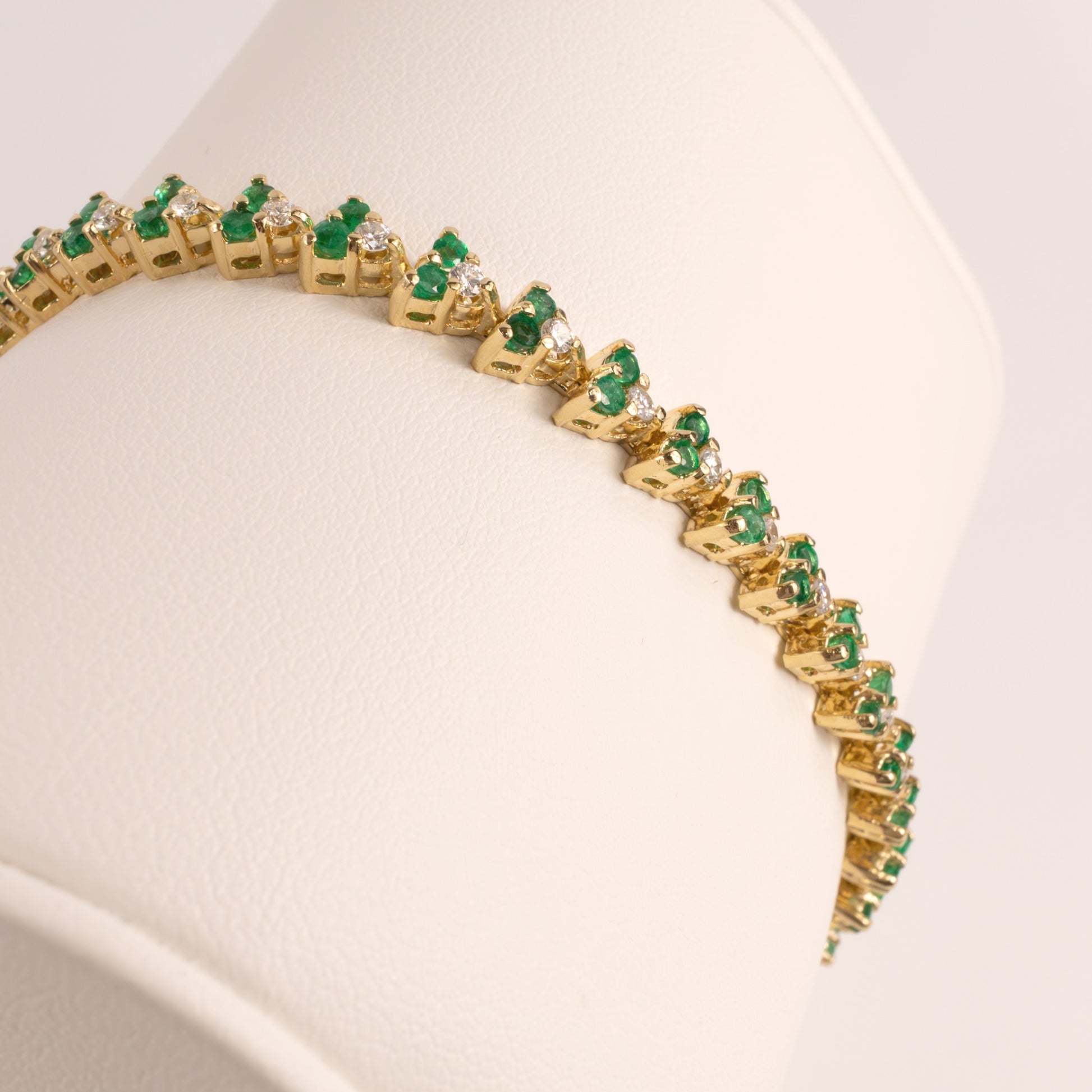 14KYG Emerald and Diamond 3-Stone Link Tennis Bracelet