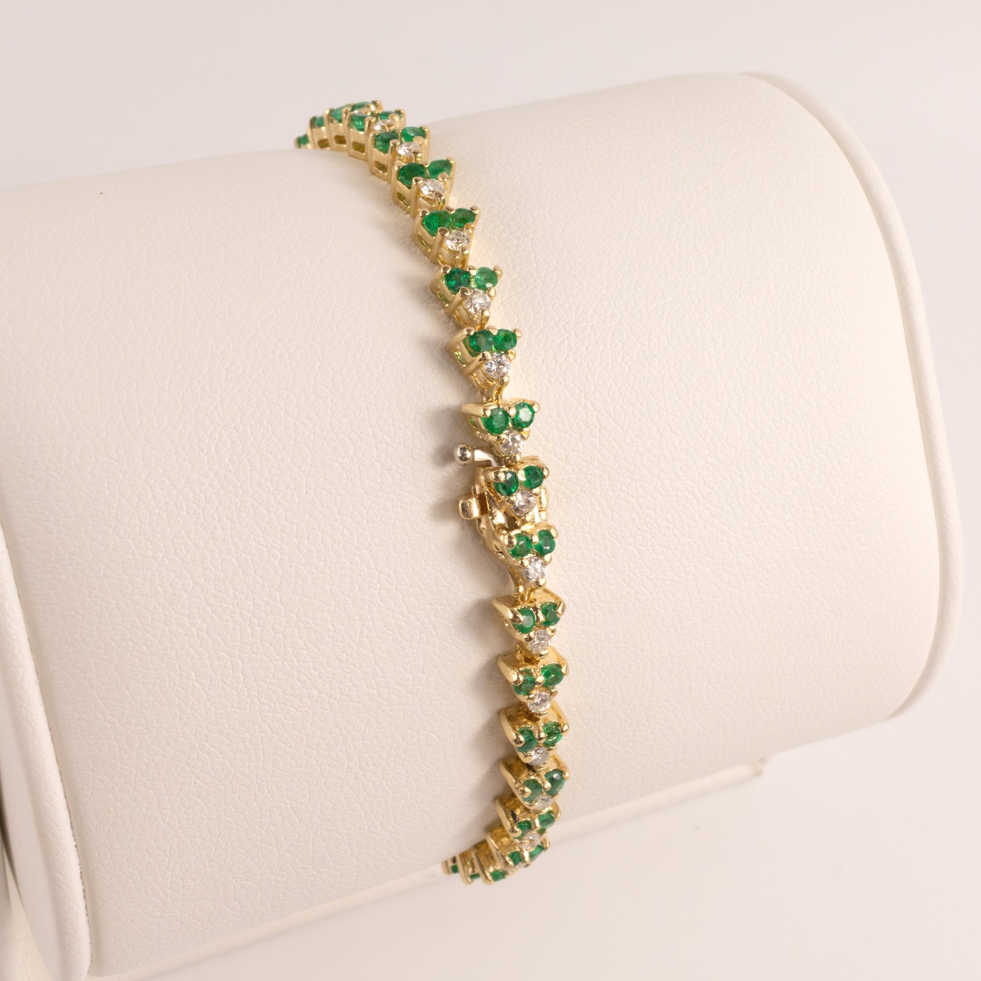 14KYG Emerald and Diamond 3-Stone Link Tennis Bracelet