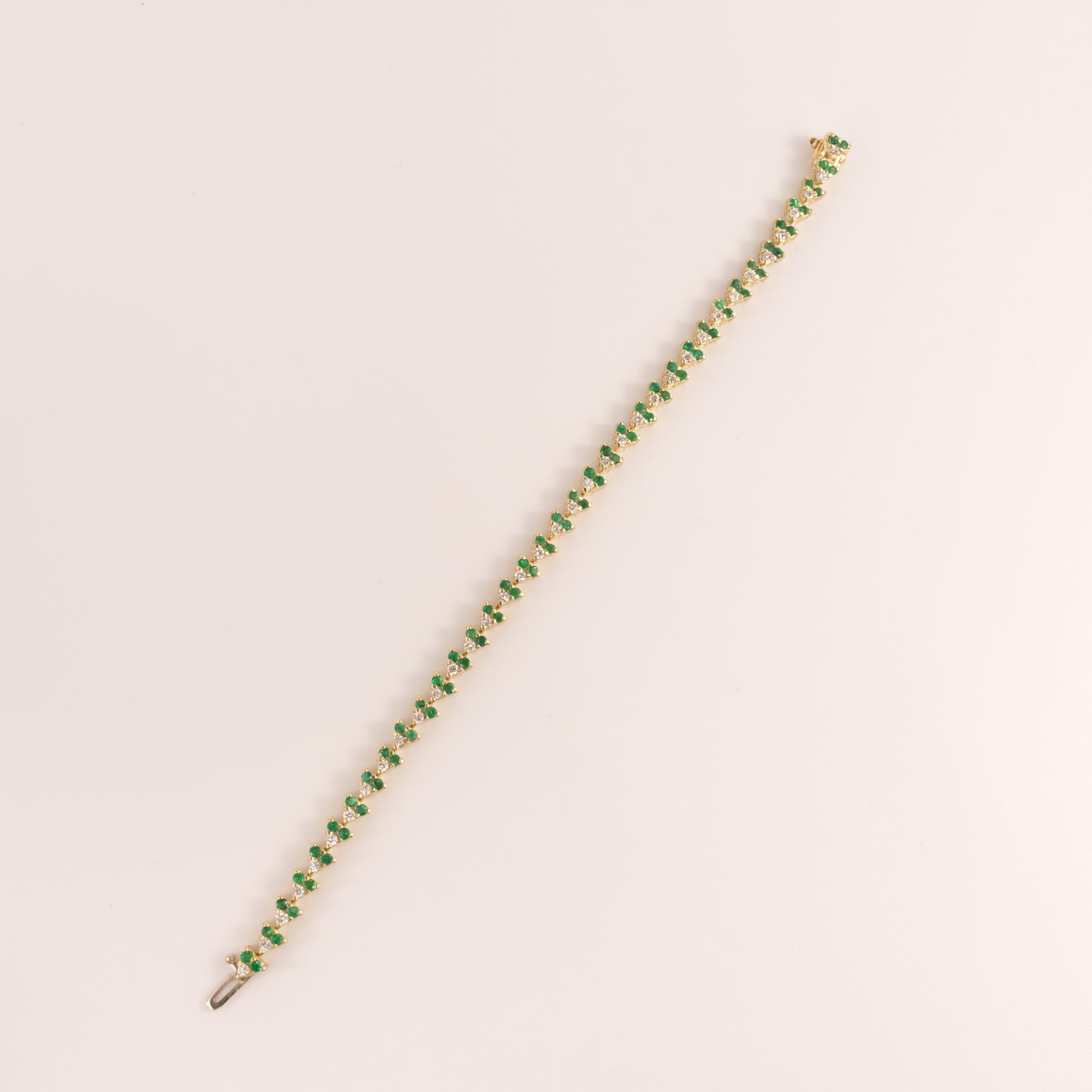 14KYG Emerald and Diamond 3-Stone Link Tennis Bracelet