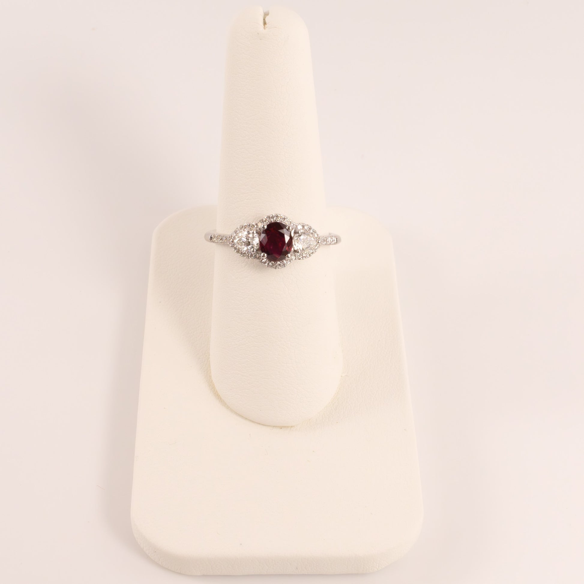 14KWG Ruby Oval with Diamond Pears and Halo Ring