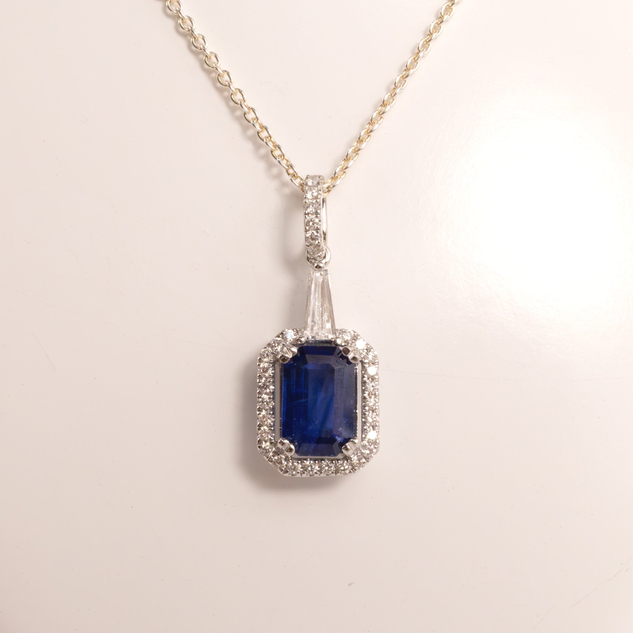 14KWG Blue Sapphire Emerald Cut and Diamond Halo Pendant